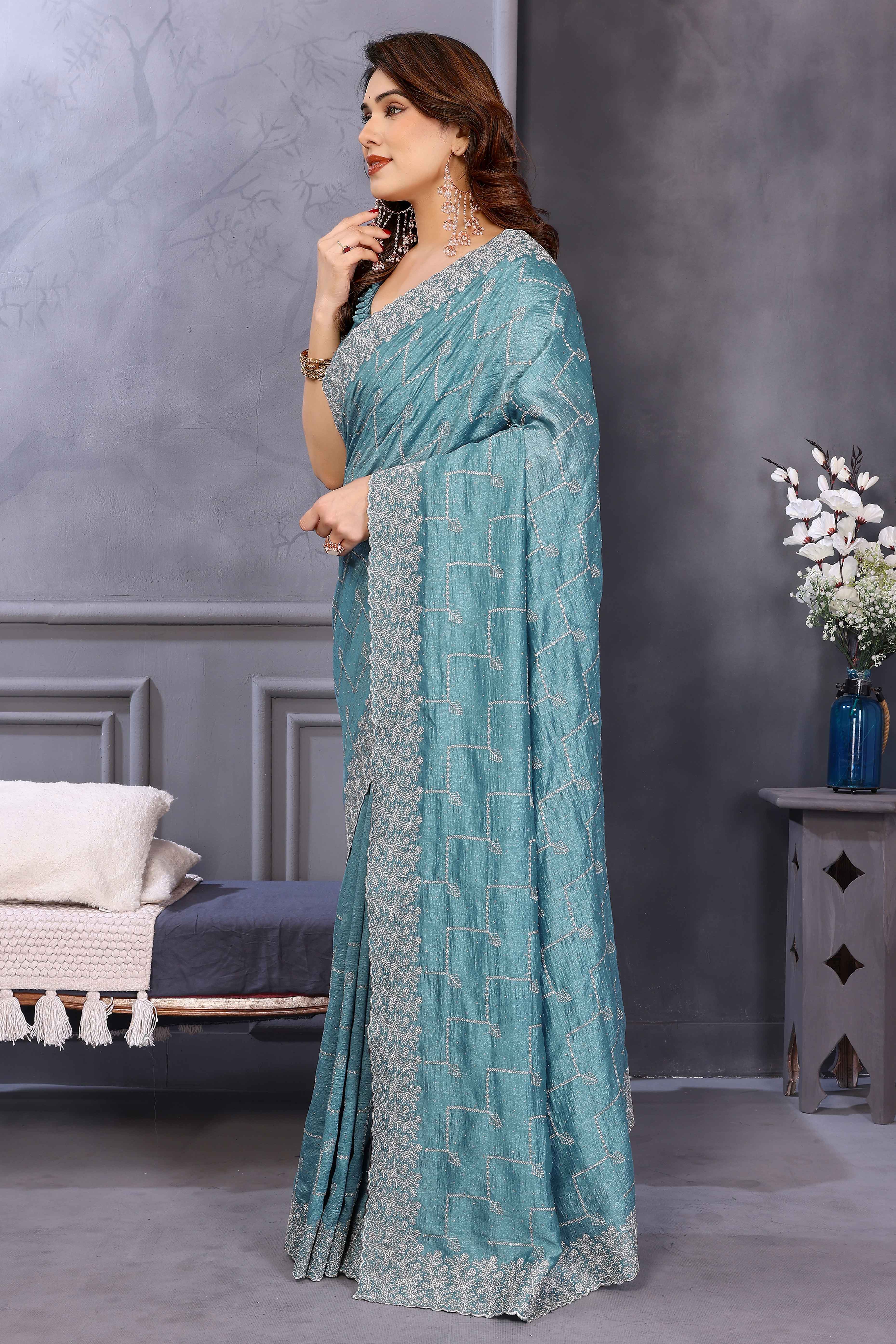 Refreshing Aqua Blue Vichitra Silk Saree with Traditional Zari Embroidery and Stone Embellishments