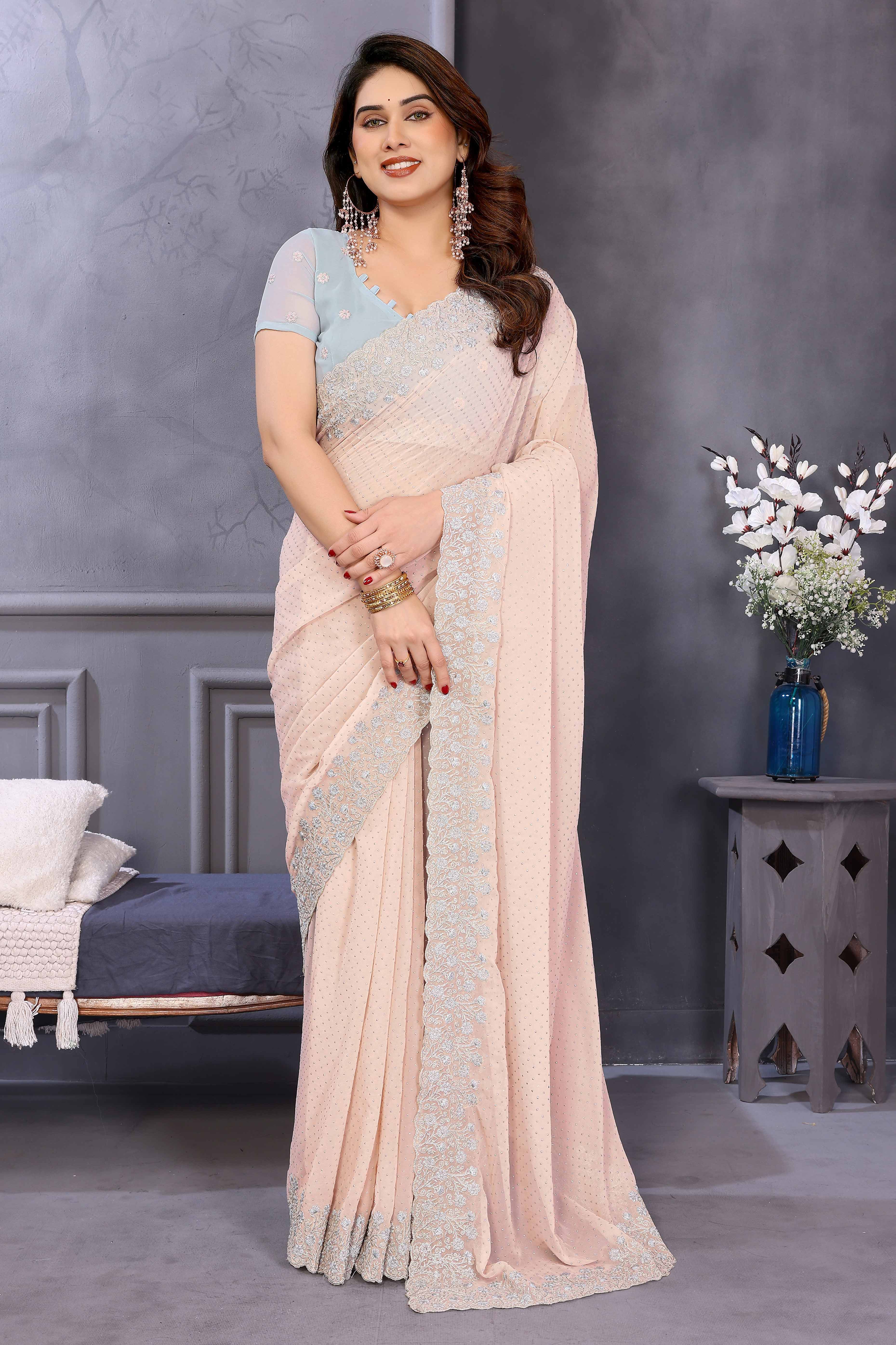 Soft Peach Georgette Saree with Subtle Zari Embroidery