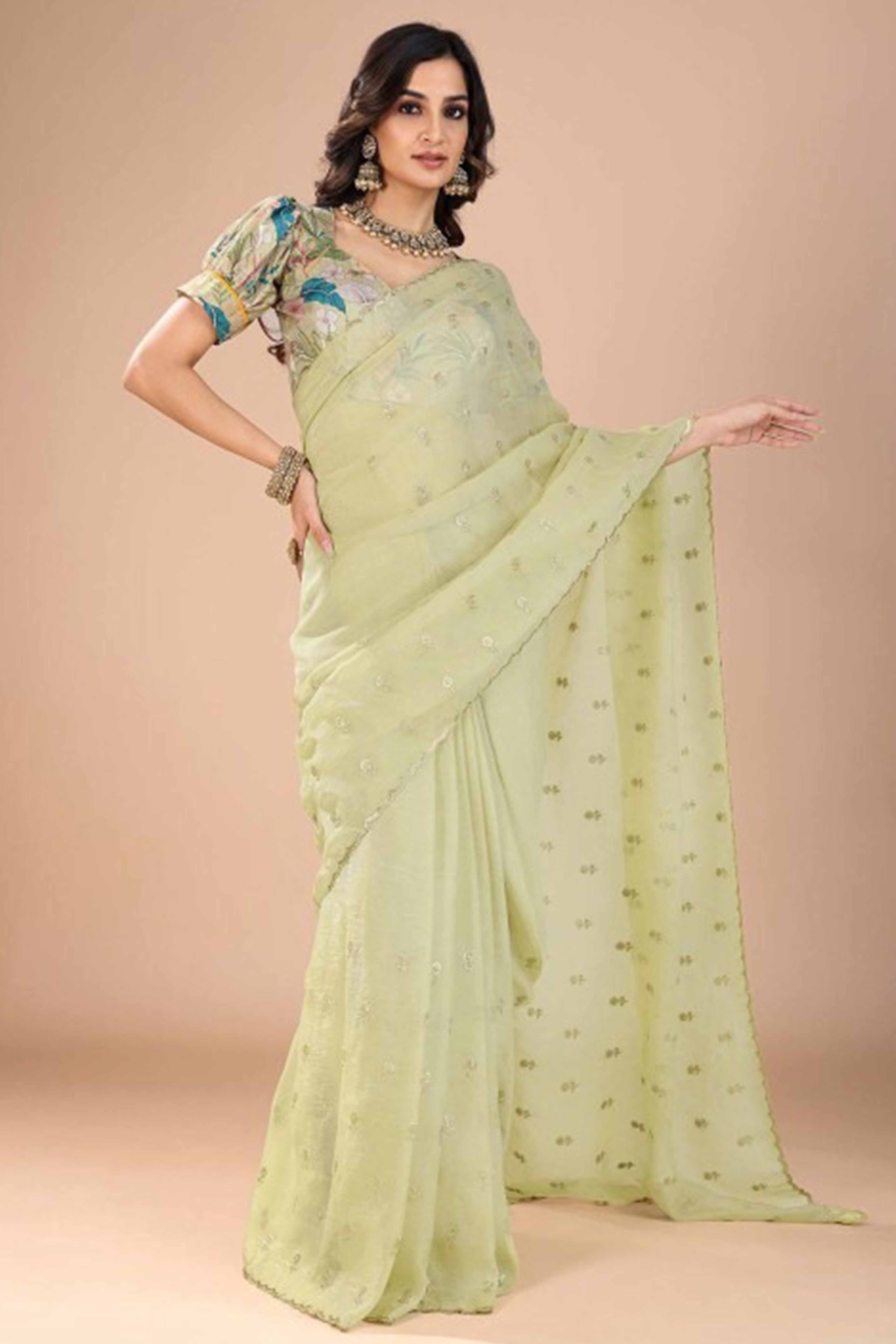 Green Crunchy Saree Adorned With Floral Sequins Embroidery & Graceful Border Finish