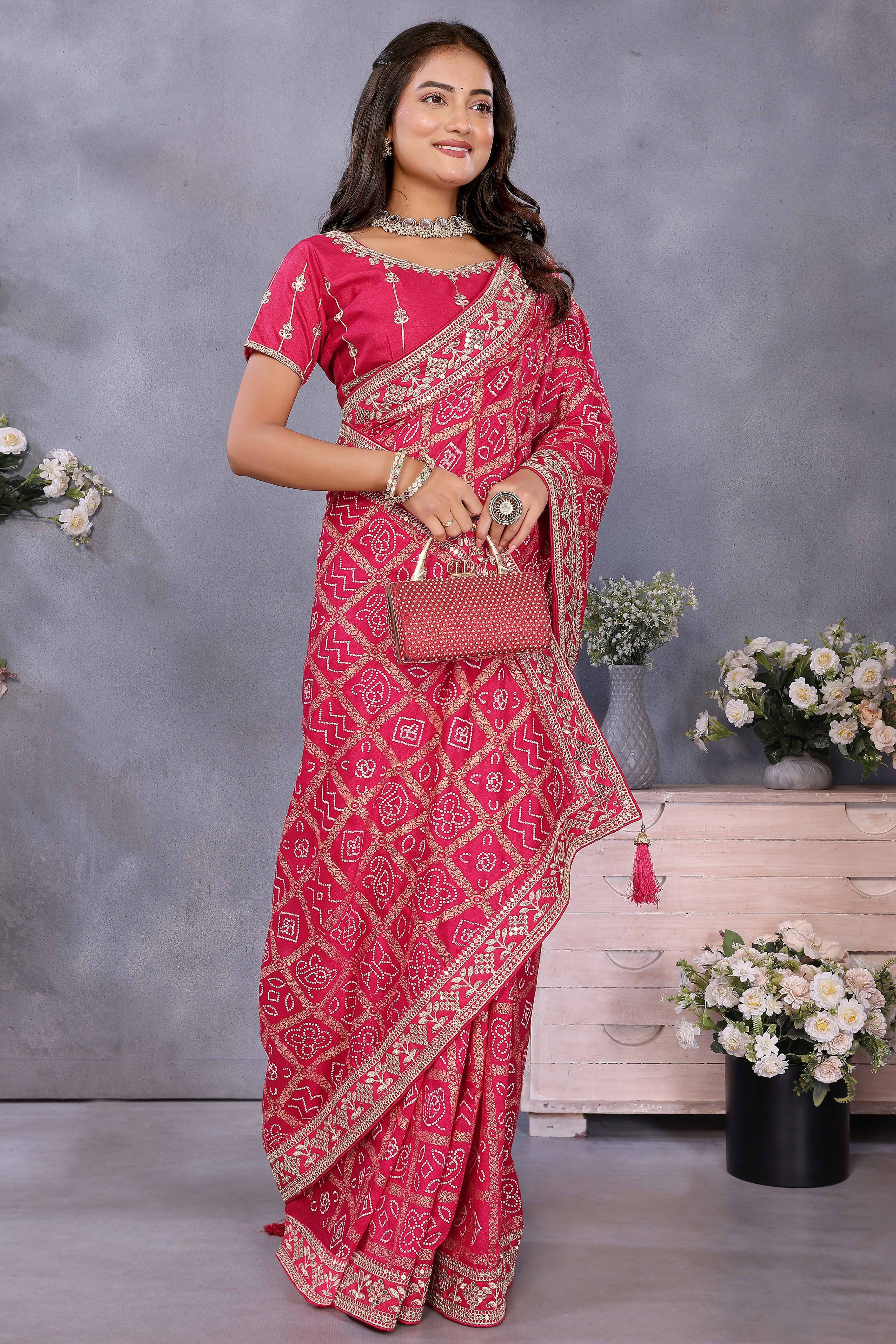 Pink Vichitra Silk Saree Highlighted with Bandhani Print and Sequins Embroidered Border