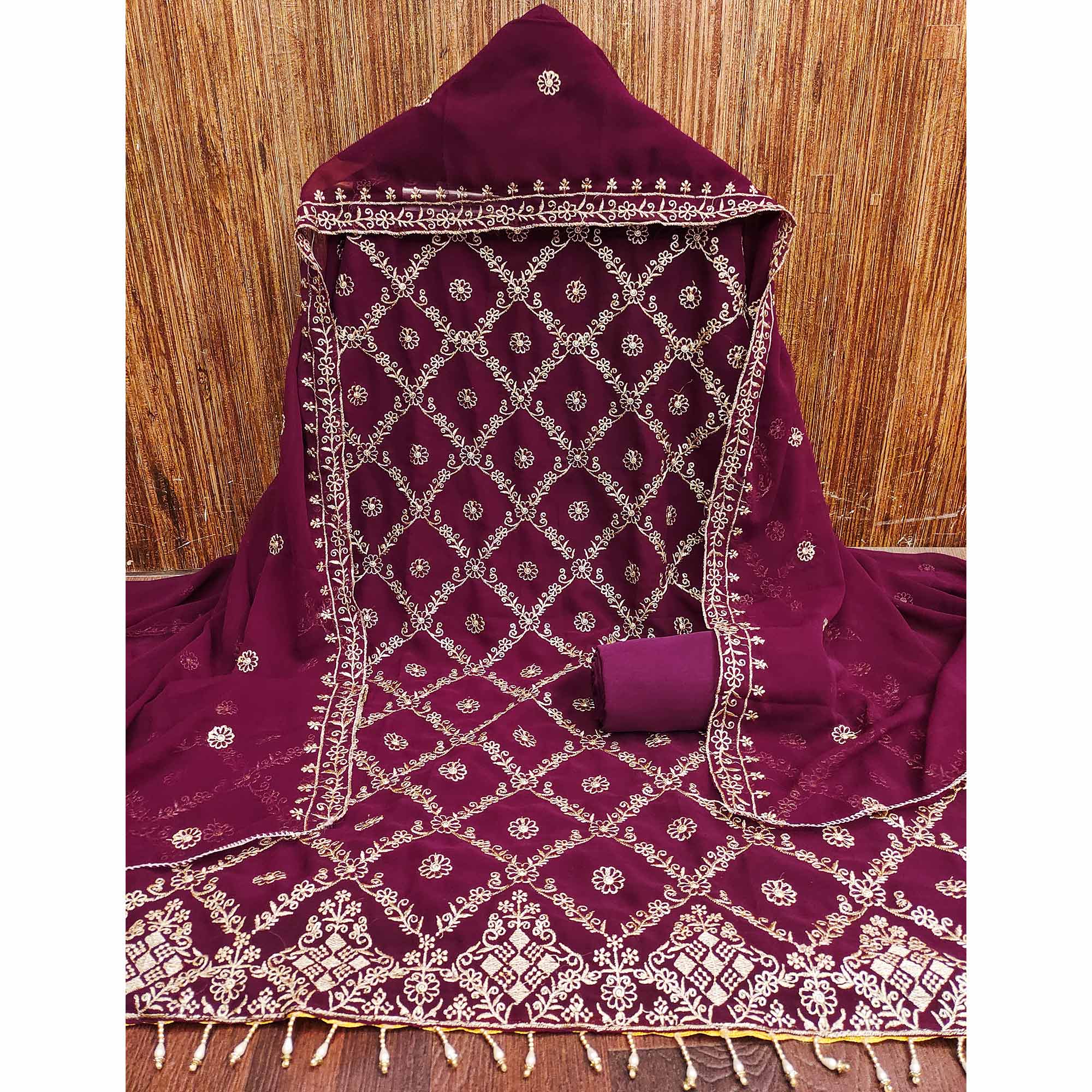 A Mesmerizing Creation Wine Floral Embroidered Georgette Dress Material