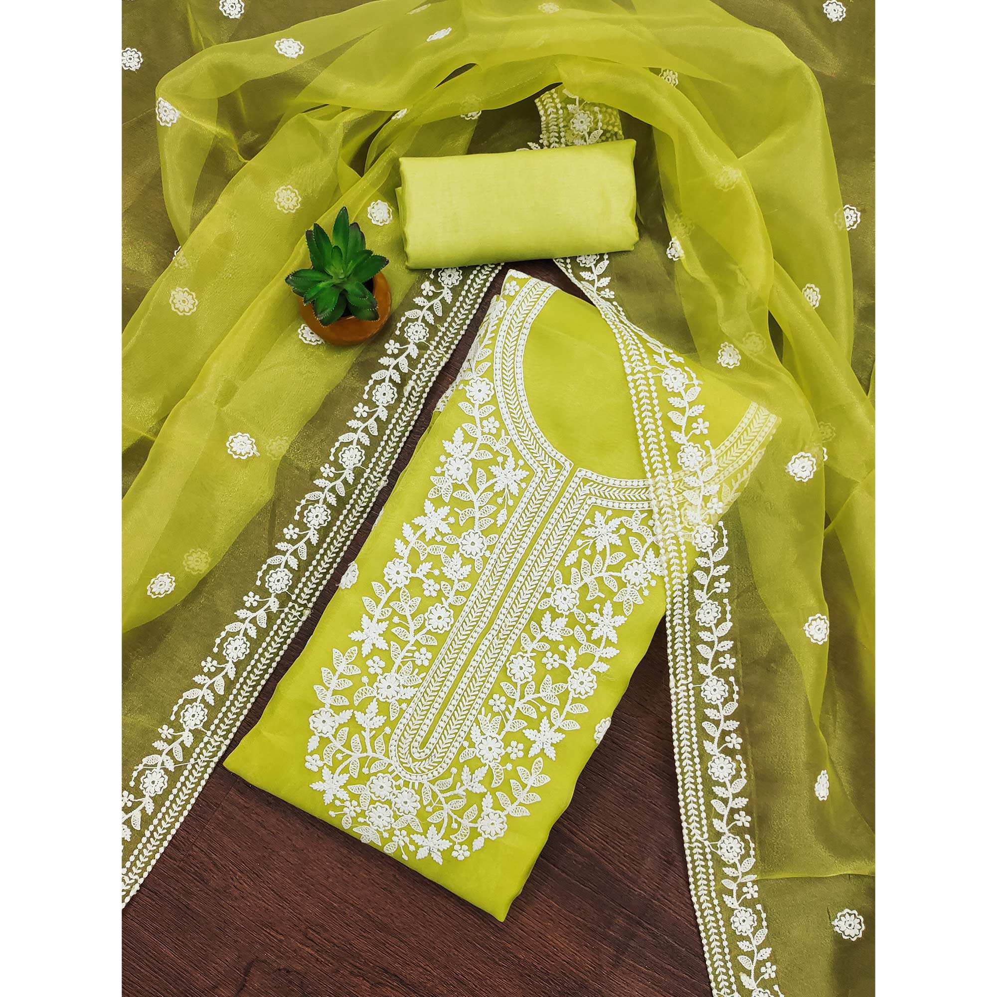 Unleash Your Style With This Green Floral Thread Embroidered Organza Dress Material