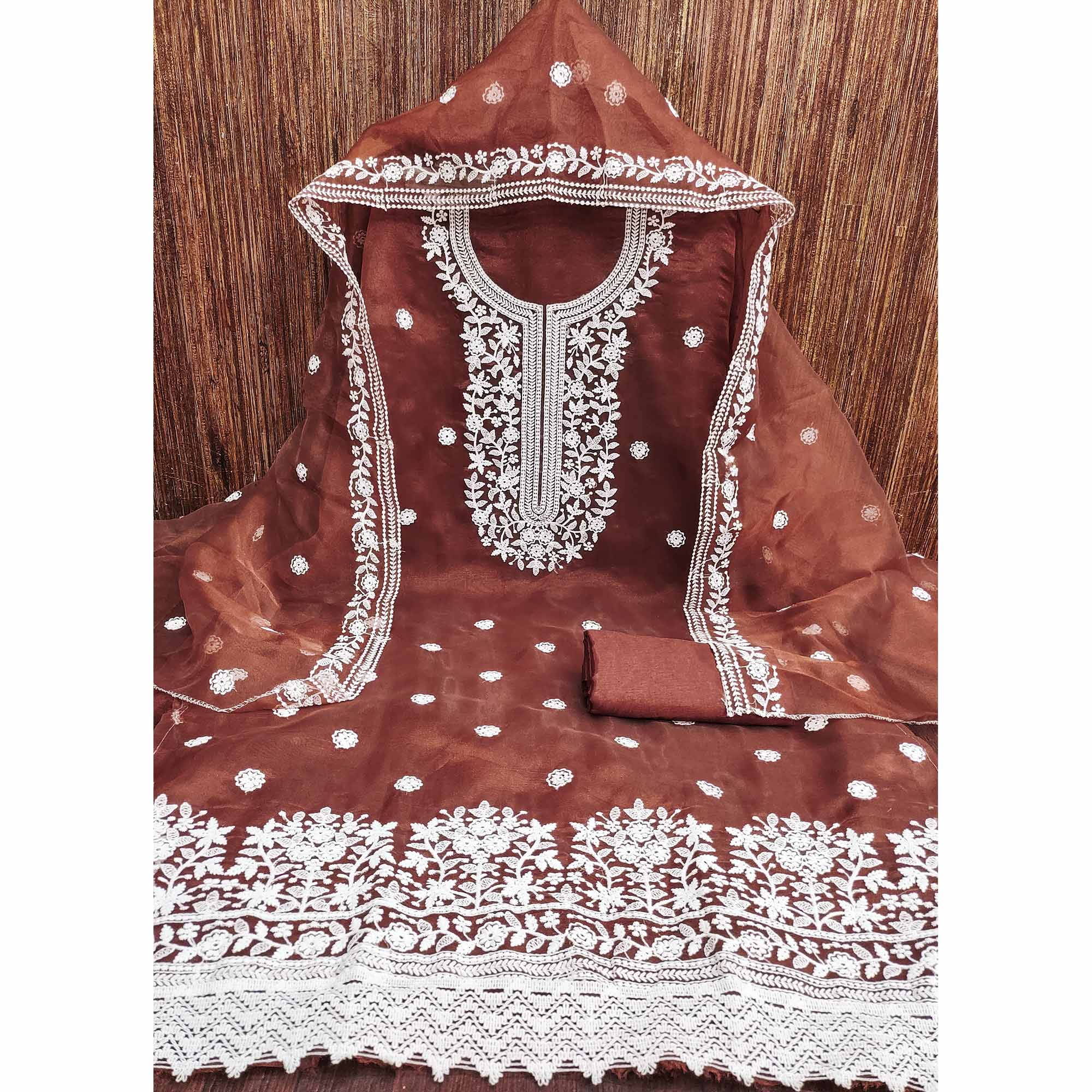 Step into Elegance With This Rust Floral Thread Embroidered Organza Dress Material