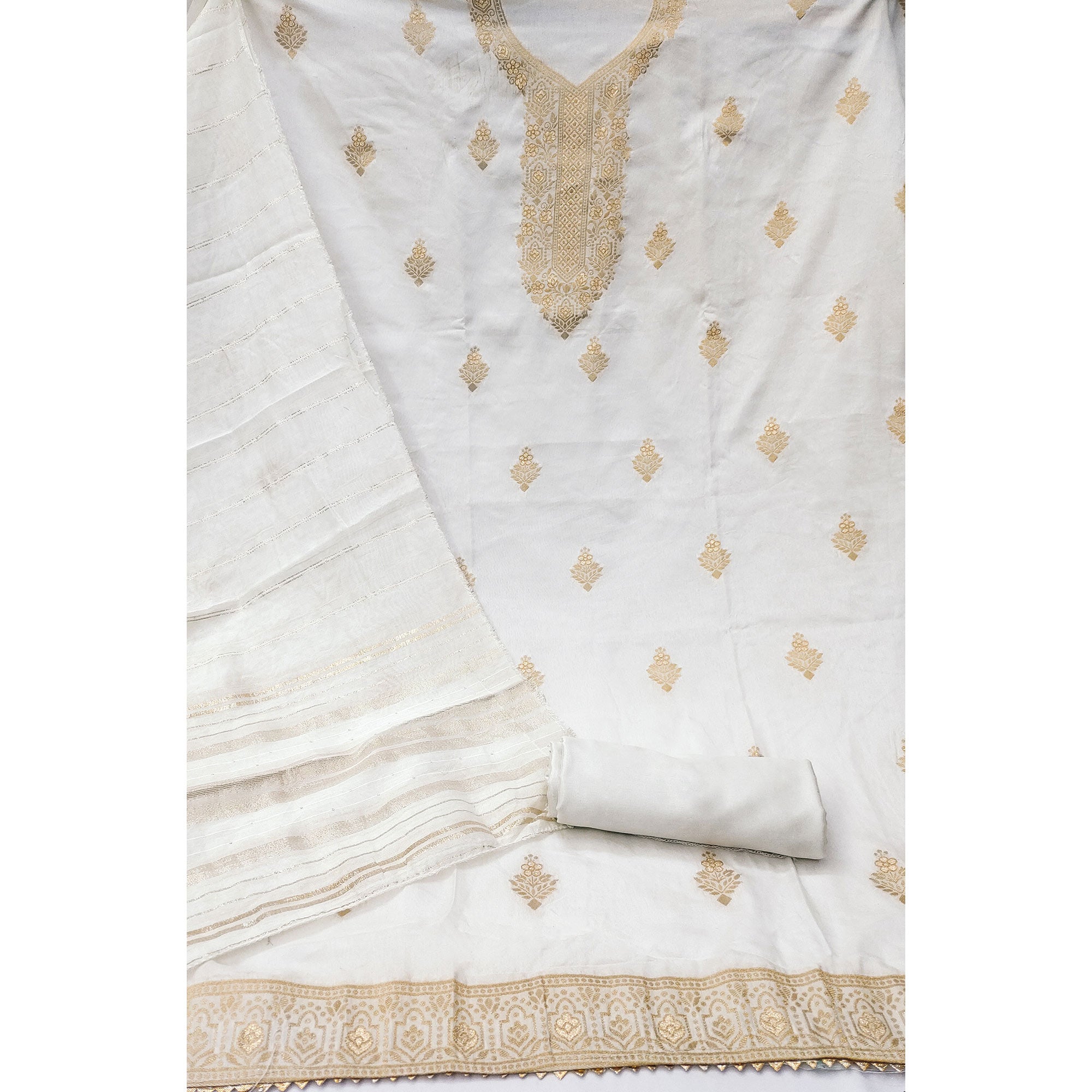 Timeless Offwhite Banarasi Jacquard Dress Material Adorned With Ornate Zari Floral Weaves