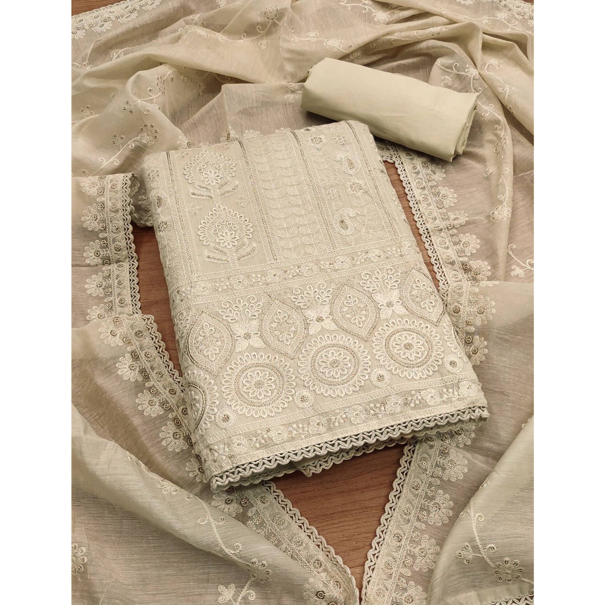 Graceful Cream Chanderi Silk Dress Material Featuring Intricate Lucknowi Embroidery