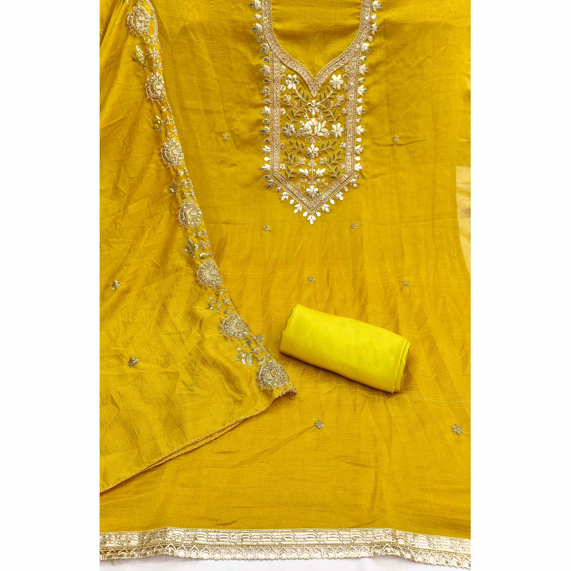 Timeless Mustard Floral Embroidered Vichitra Silk Dress Material Highlighted With Gota Patti Work