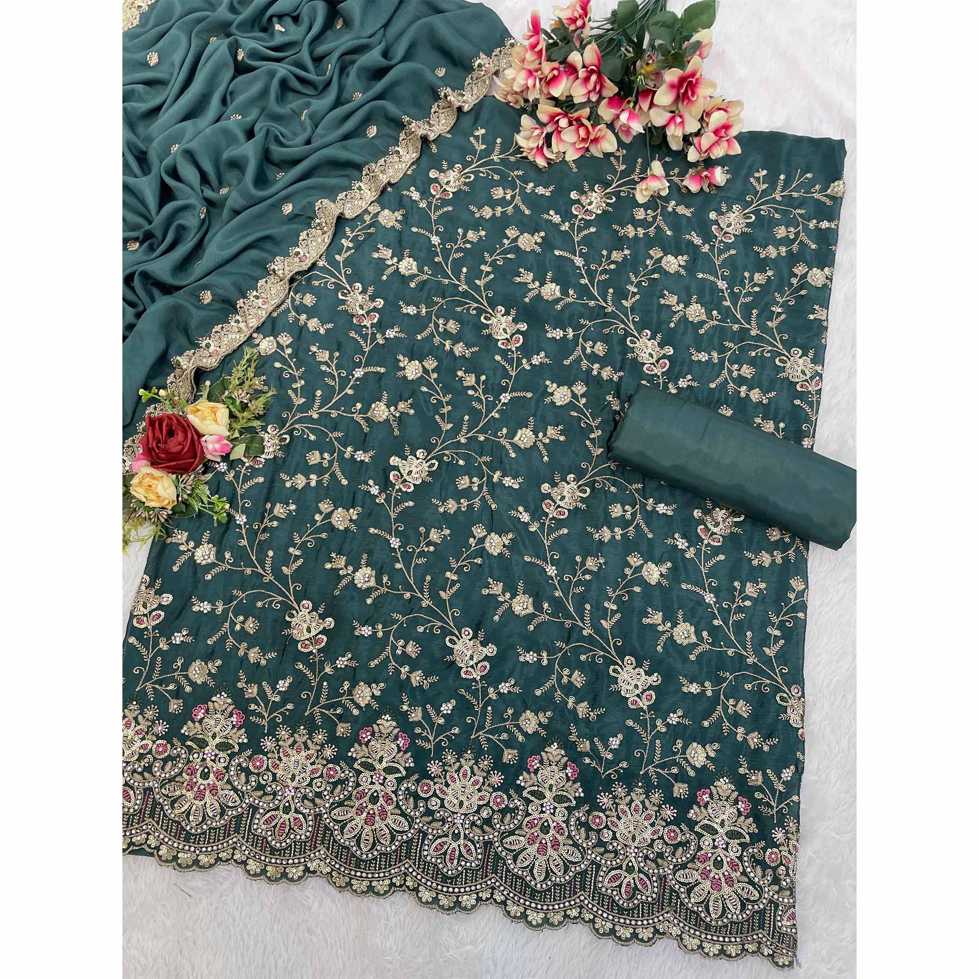 Embroidered Teal Semi Stitched Suit With A Touch of Sequin & Studded Zarkan Work