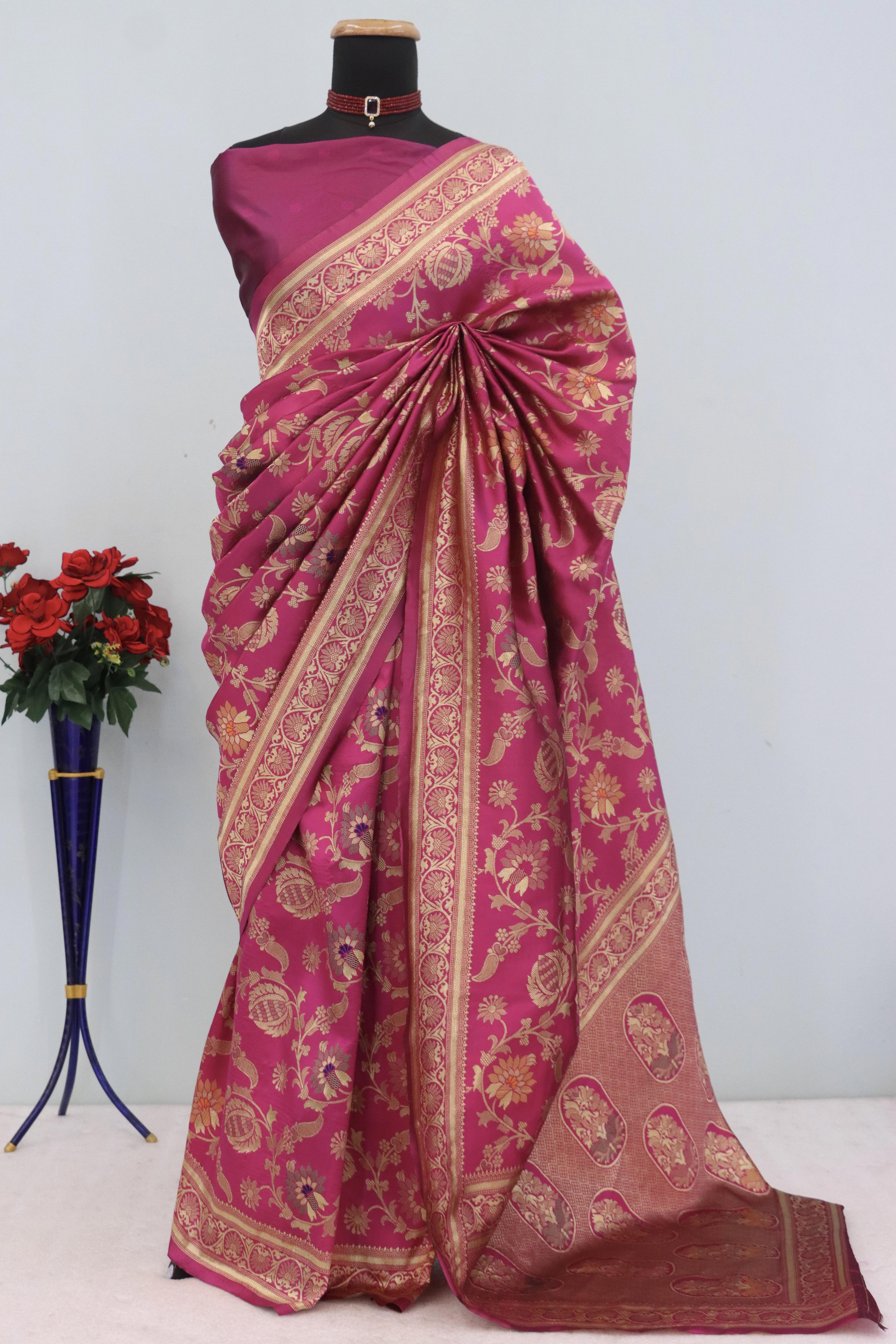 Charming Rani Pink Banarasi Silk Saree Adorned With Floral Zari Weaving