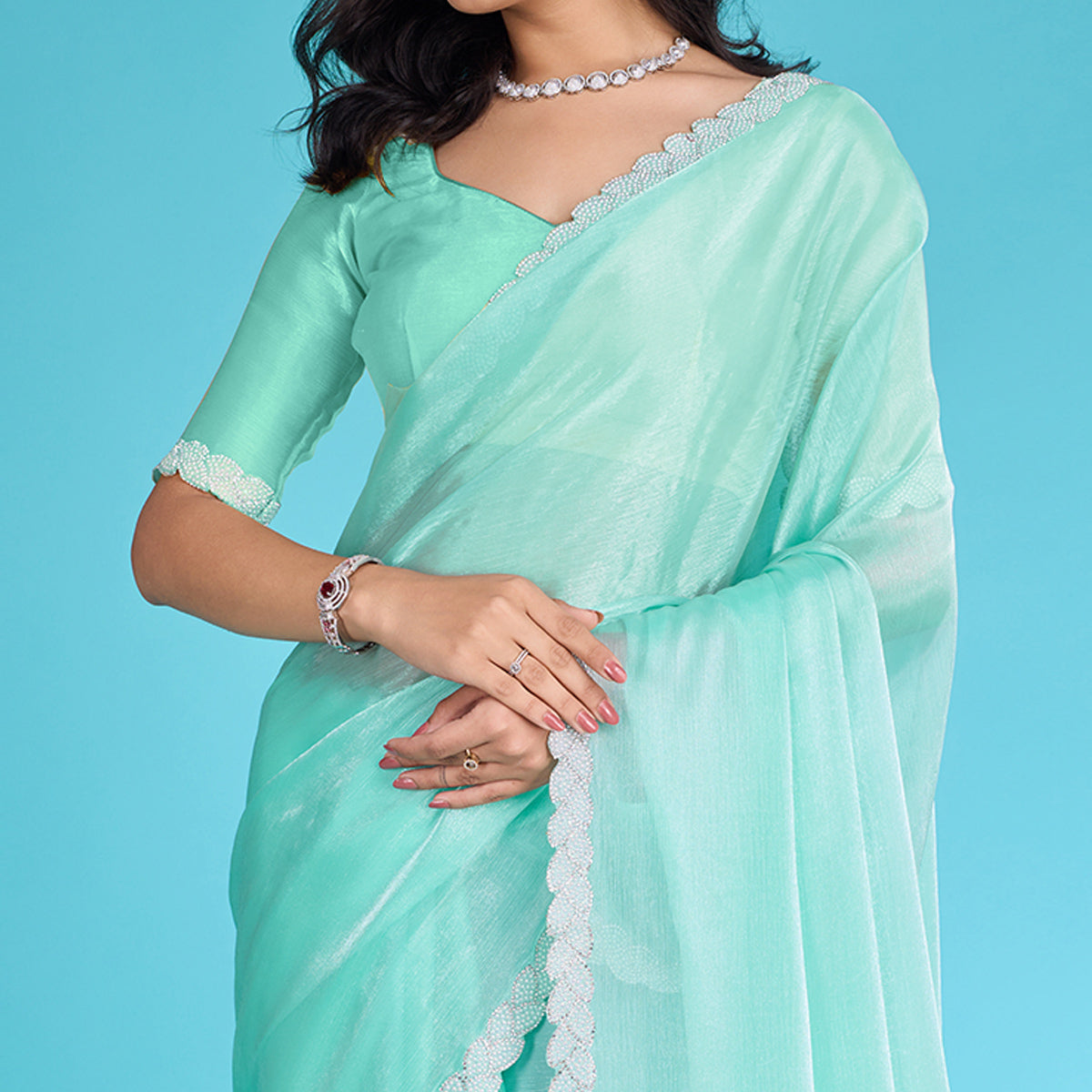Turquoise Solid With Zarkan & Ceramic Pearl Diamond Lace Tissue Saree