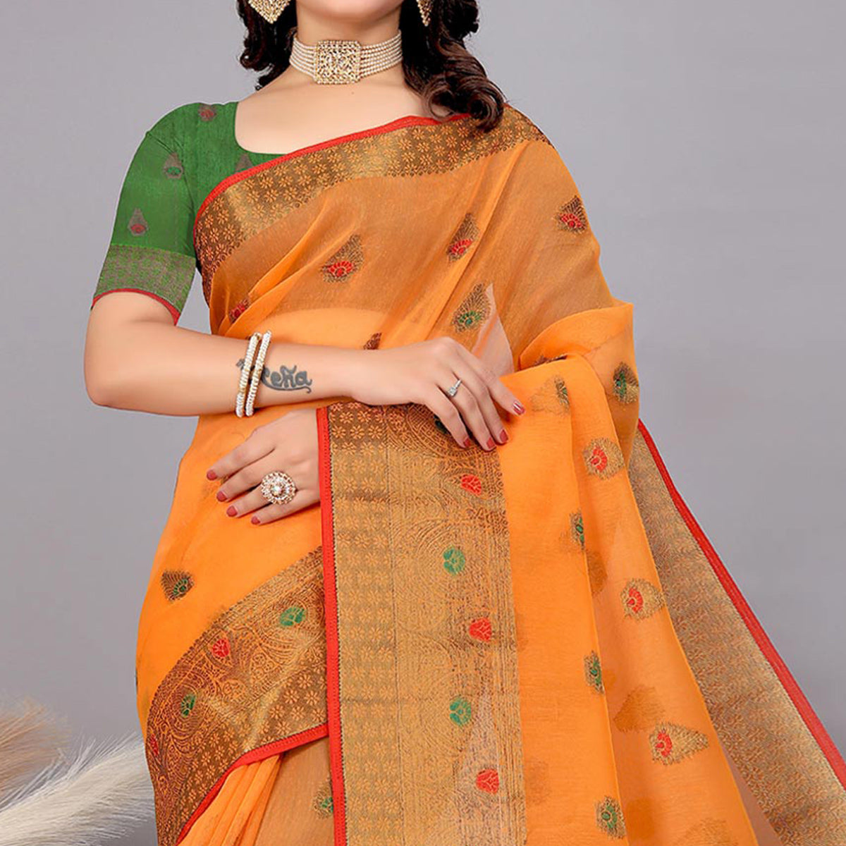 Orange Floral Woven Cotton Silk Saree With Tassels