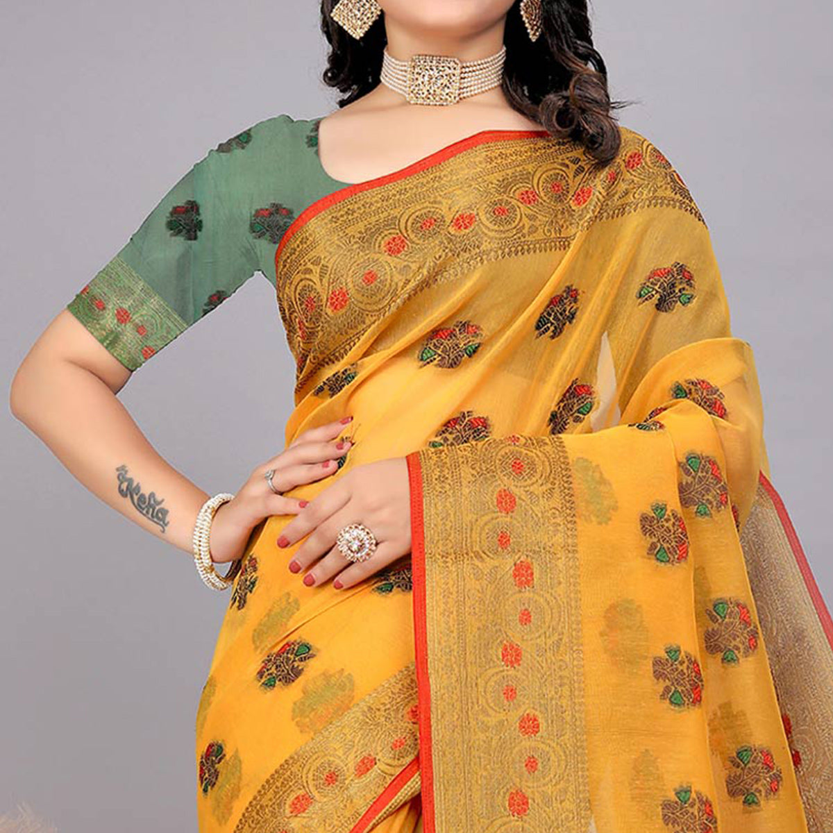 Yellow Floral Woven Cotton Silk Saree With Tassels