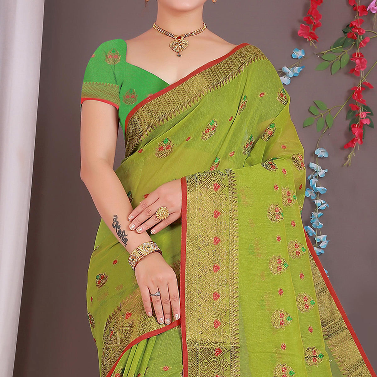 Green Floral Woven Cotton Silk Saree With Tassels