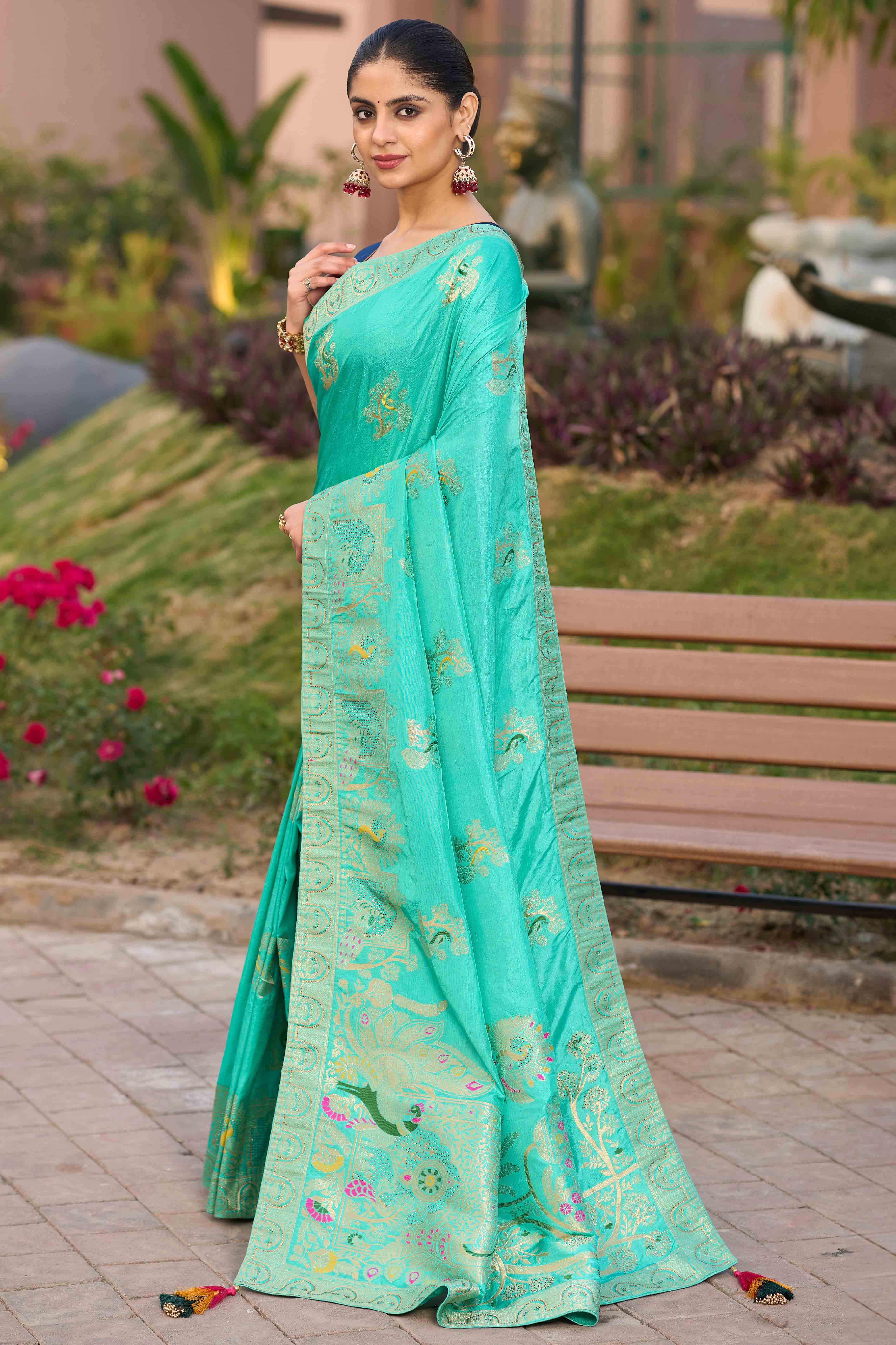 Radiant Turquoise Dola Silk Saree With Intricate Zari Weaving & Swarovski Accents