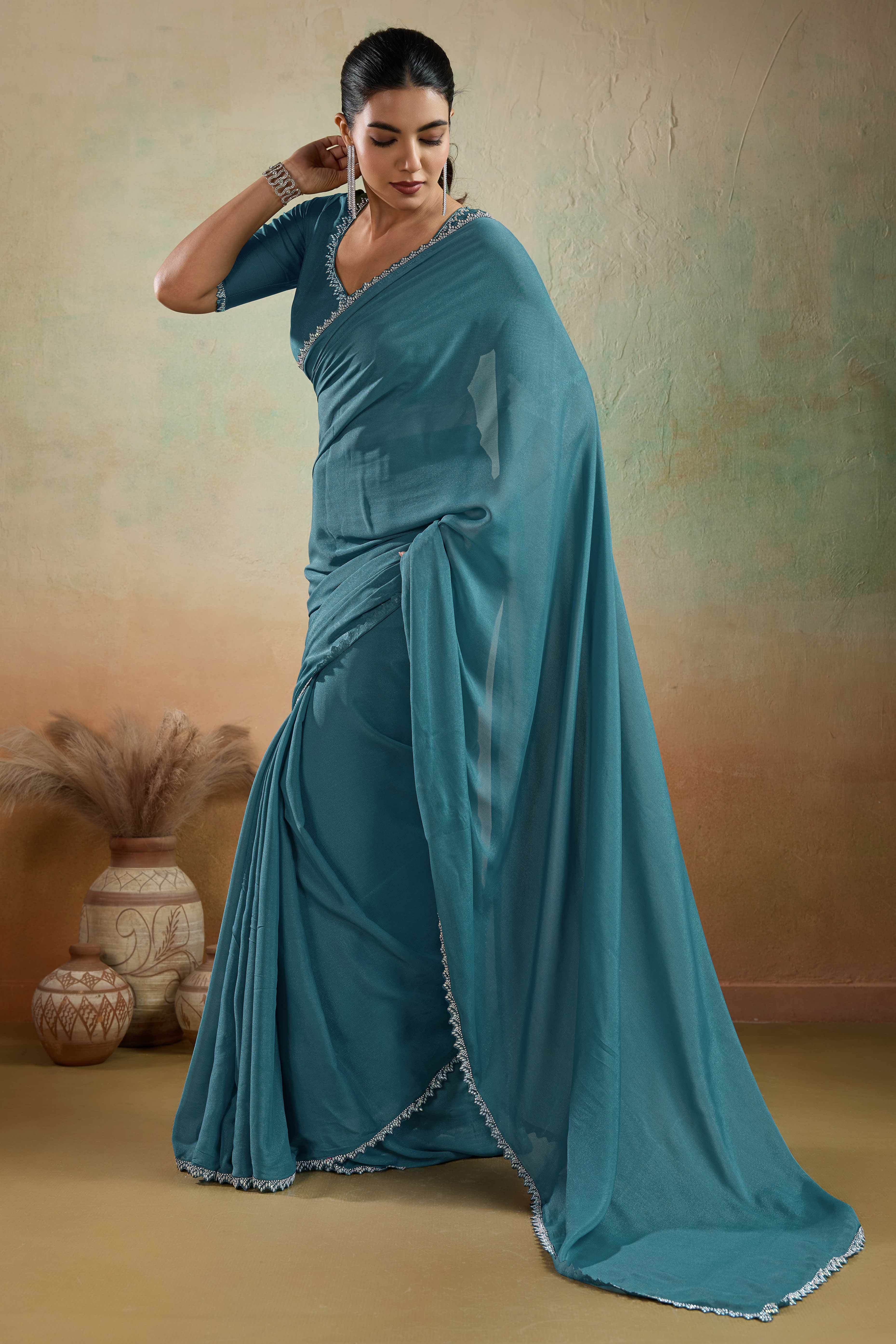 Teal Blue Solid Matt Georgette Saree With Ceramic Embellished Lace Border