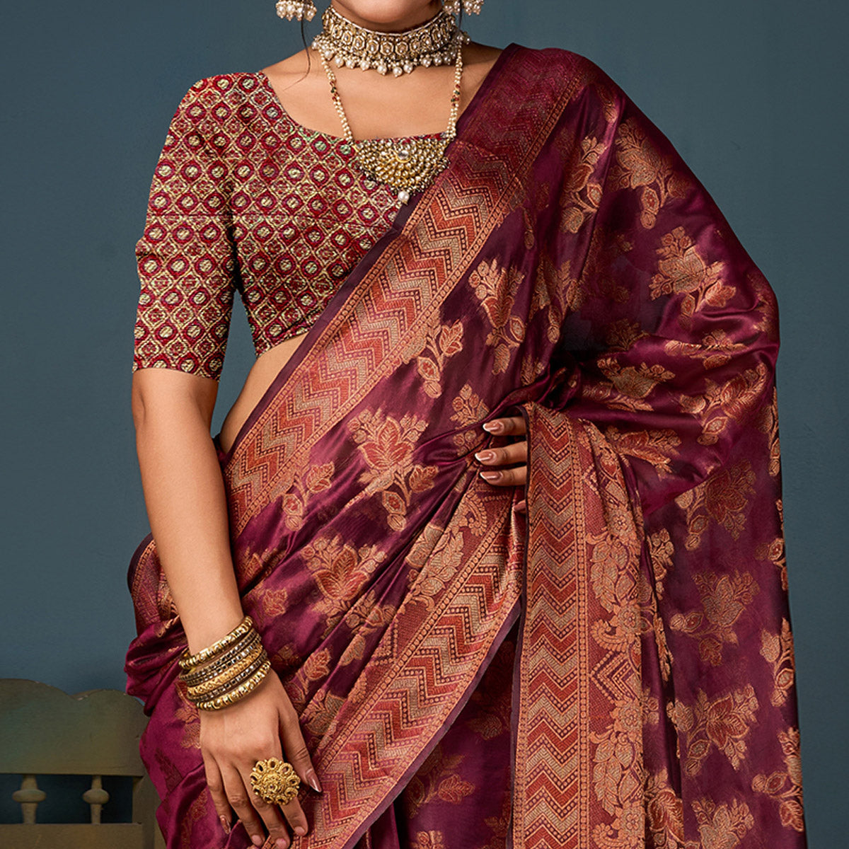 Wine Floral Woven Organza Saree With Tassels