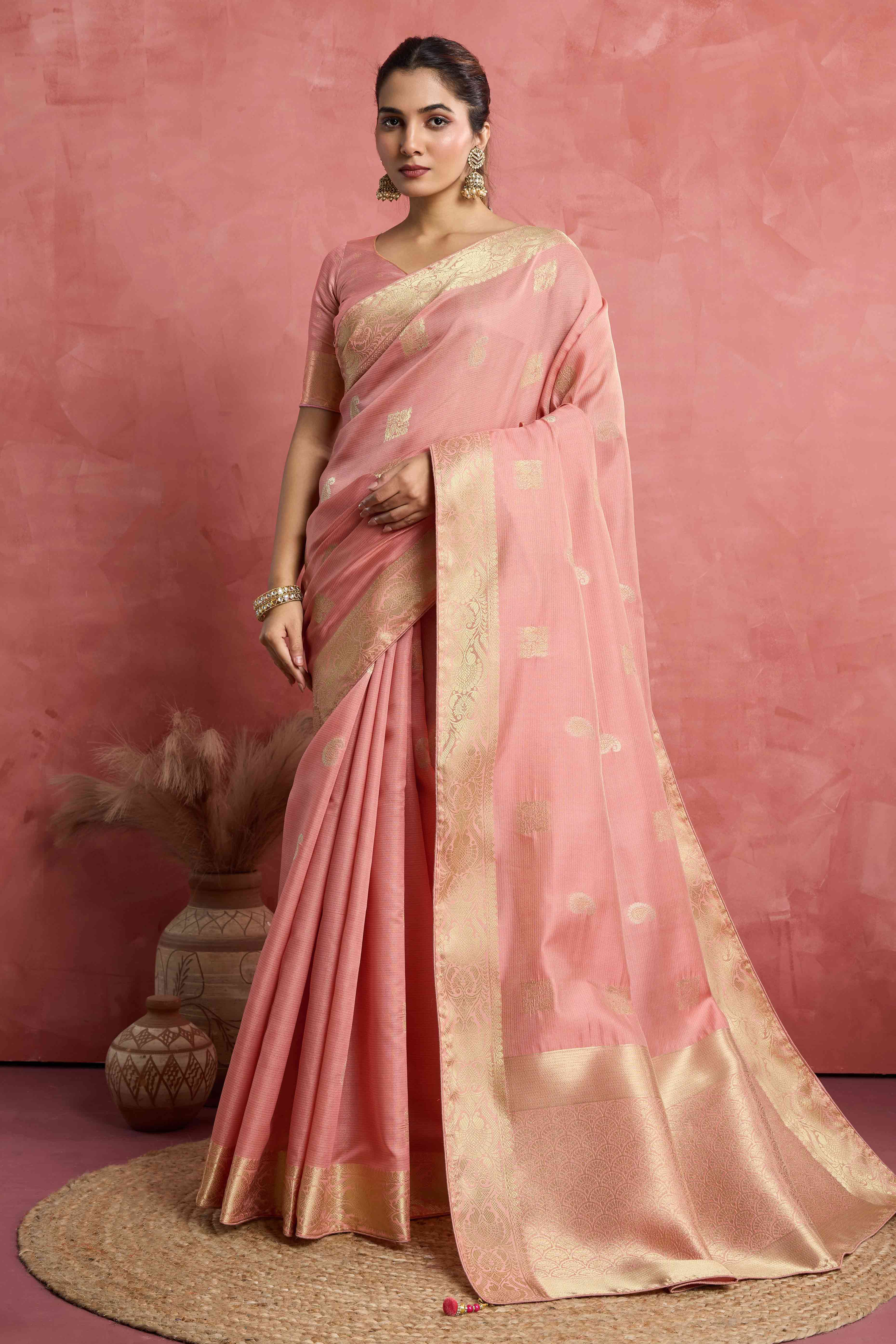 Contemporary Gajari Pink Silk Blend Saree Flaunting Alternate Buttas With Piping & Tassel Accents