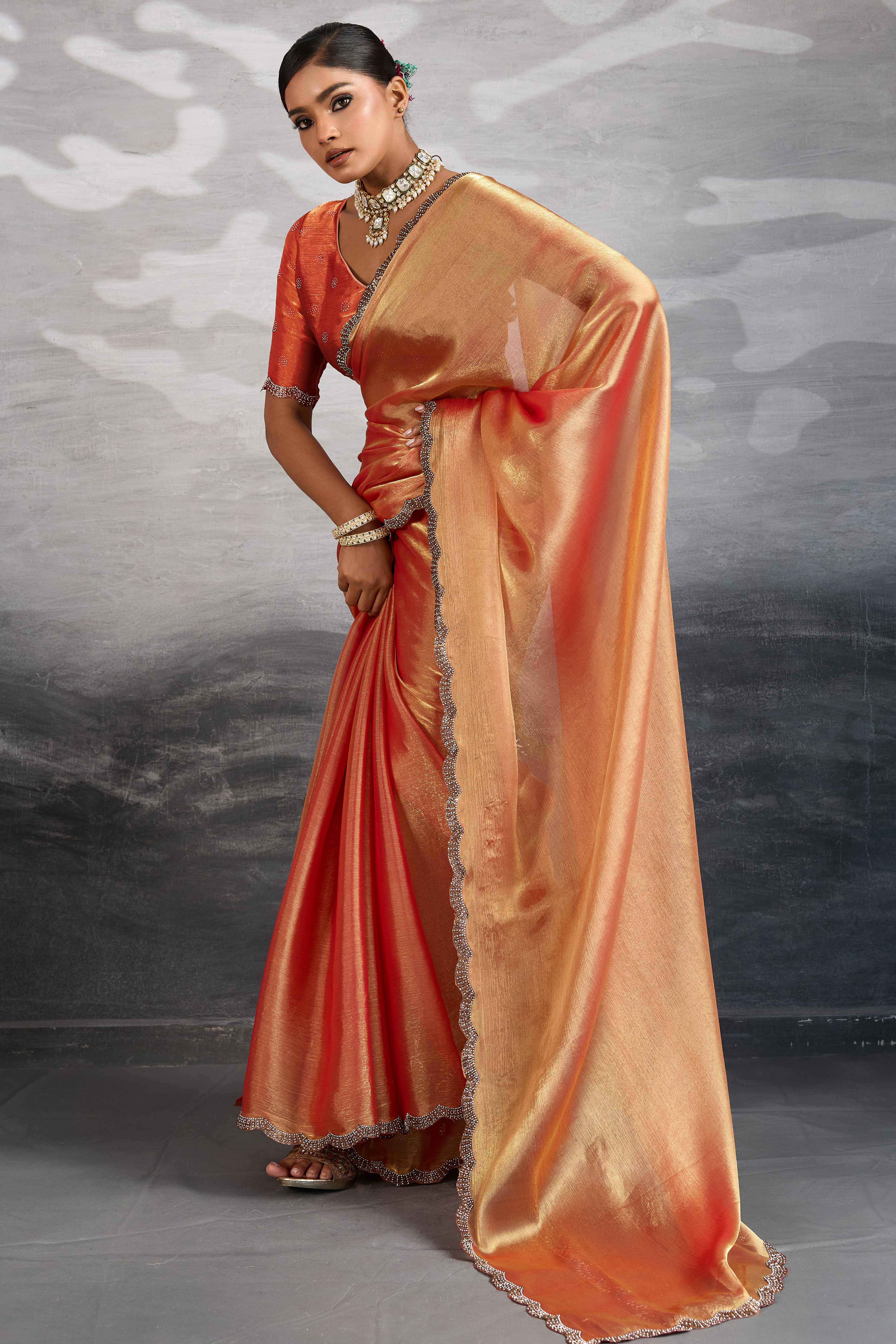 Peach Burberry Chiffon Saree Embellished With Zarkan & Cutdana Appliqué Lace Border