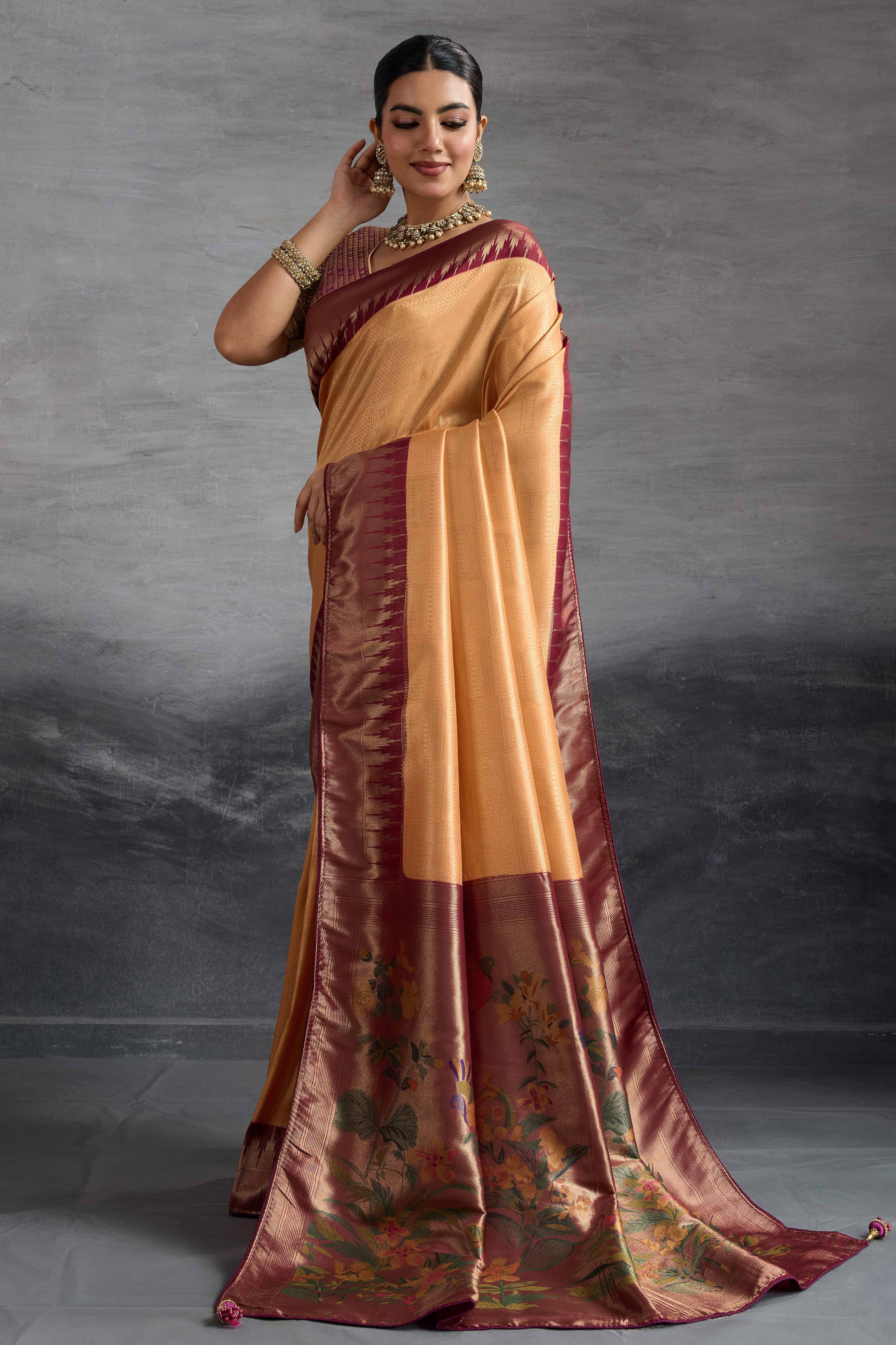 Light Orange Silk Kanjivaram Saree Enhanced With Kadiyal Weaving Borders