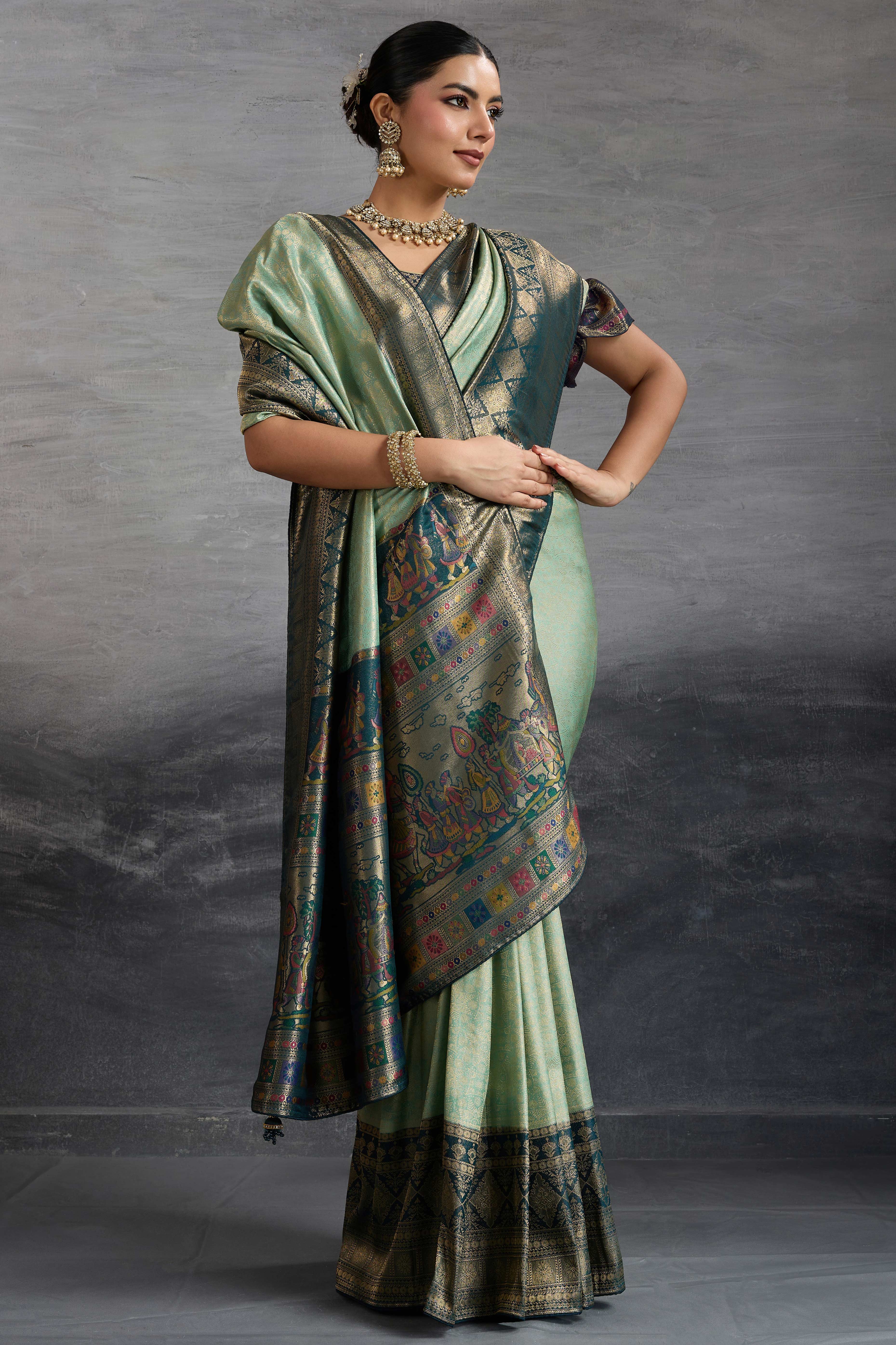 Sea Green Silk Kanjivaram Silk Saree Enhanced With Meenakari Weaving Borders