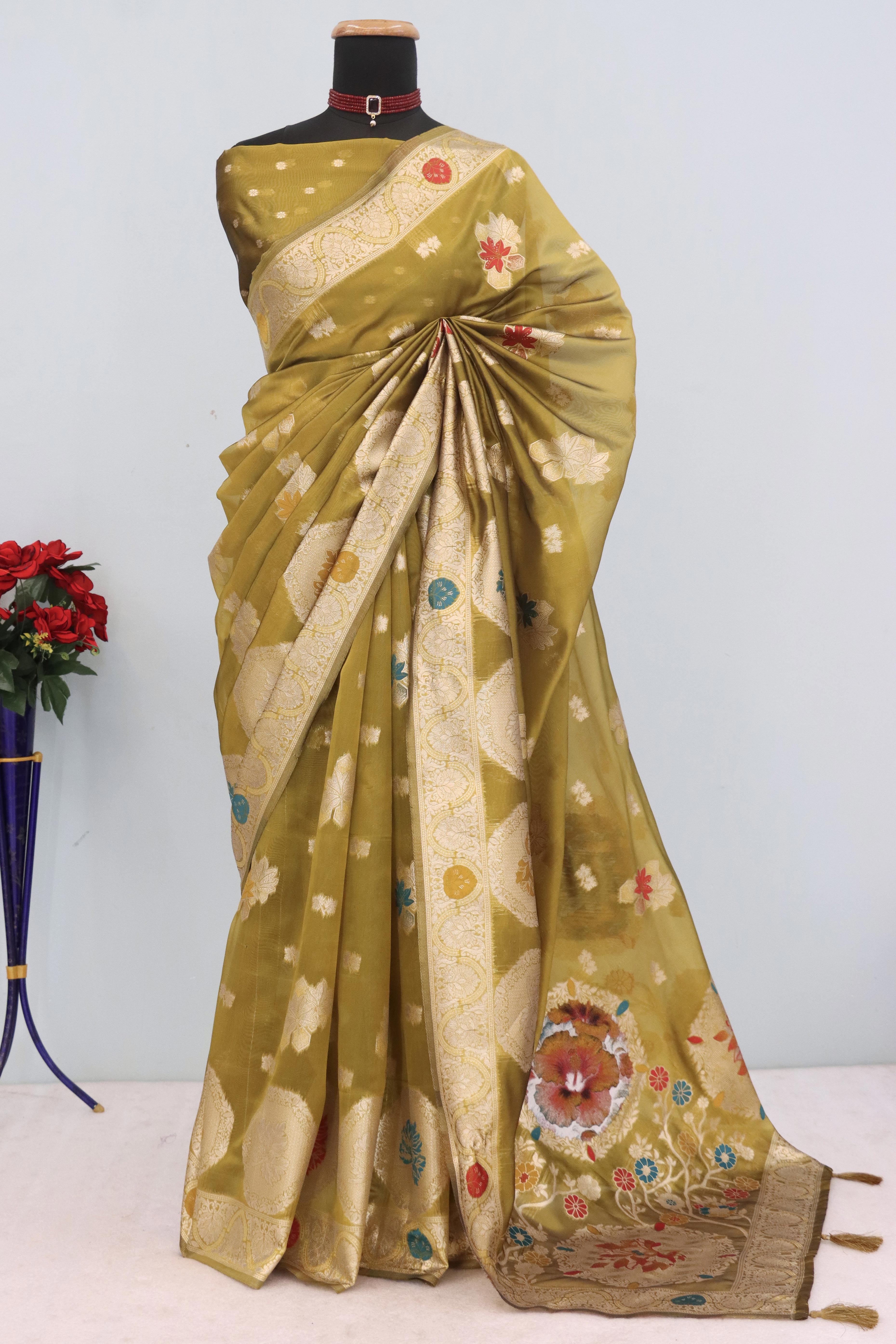 Charming Mehendi Green Zari Woven Floral Organza Saree Accented With Digital Printed Pallu & Latkan
