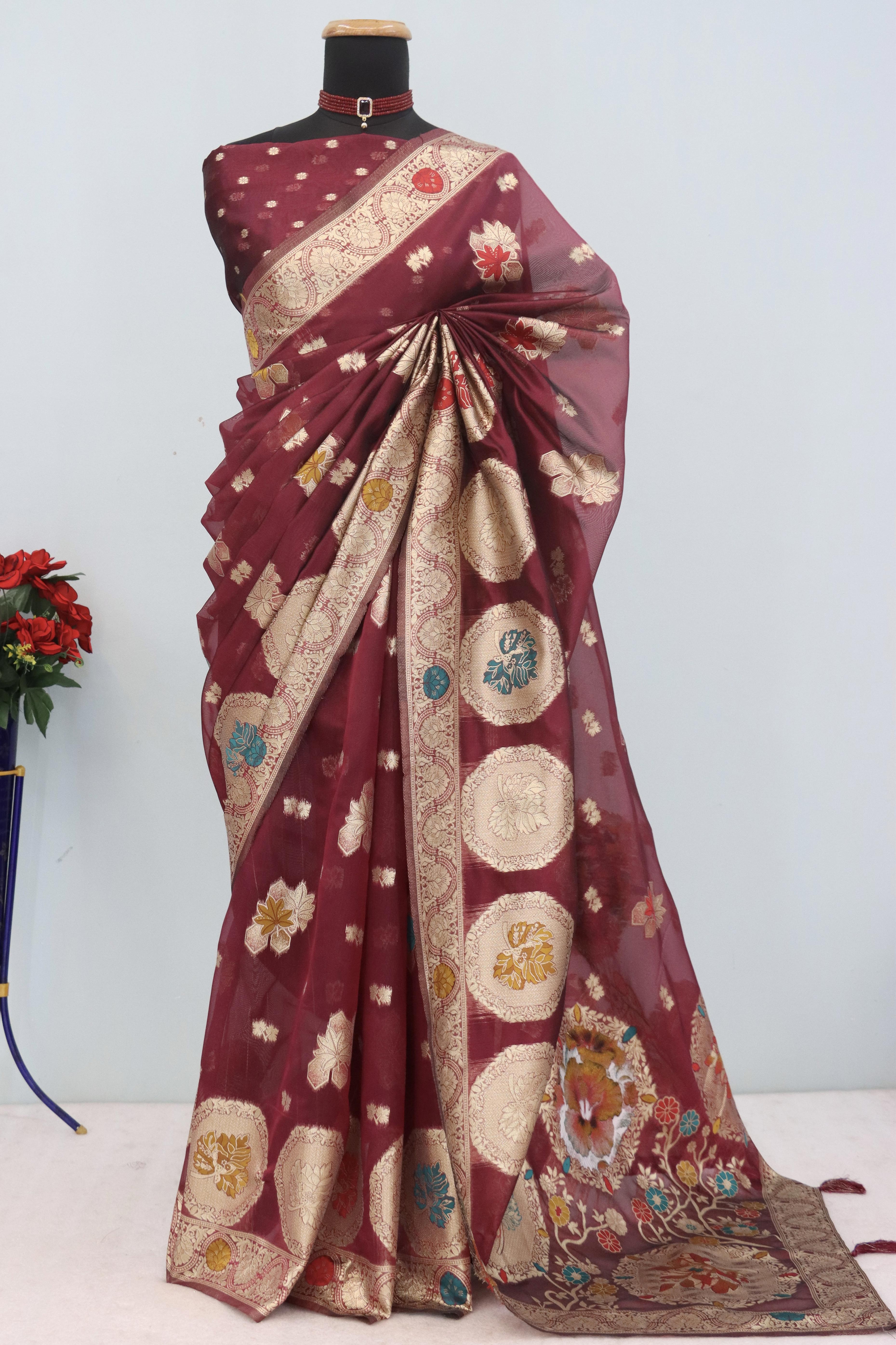 Charming Burgundy Zari Woven Floral Organza Saree Accented With Digital Printed Pallu & Latkan