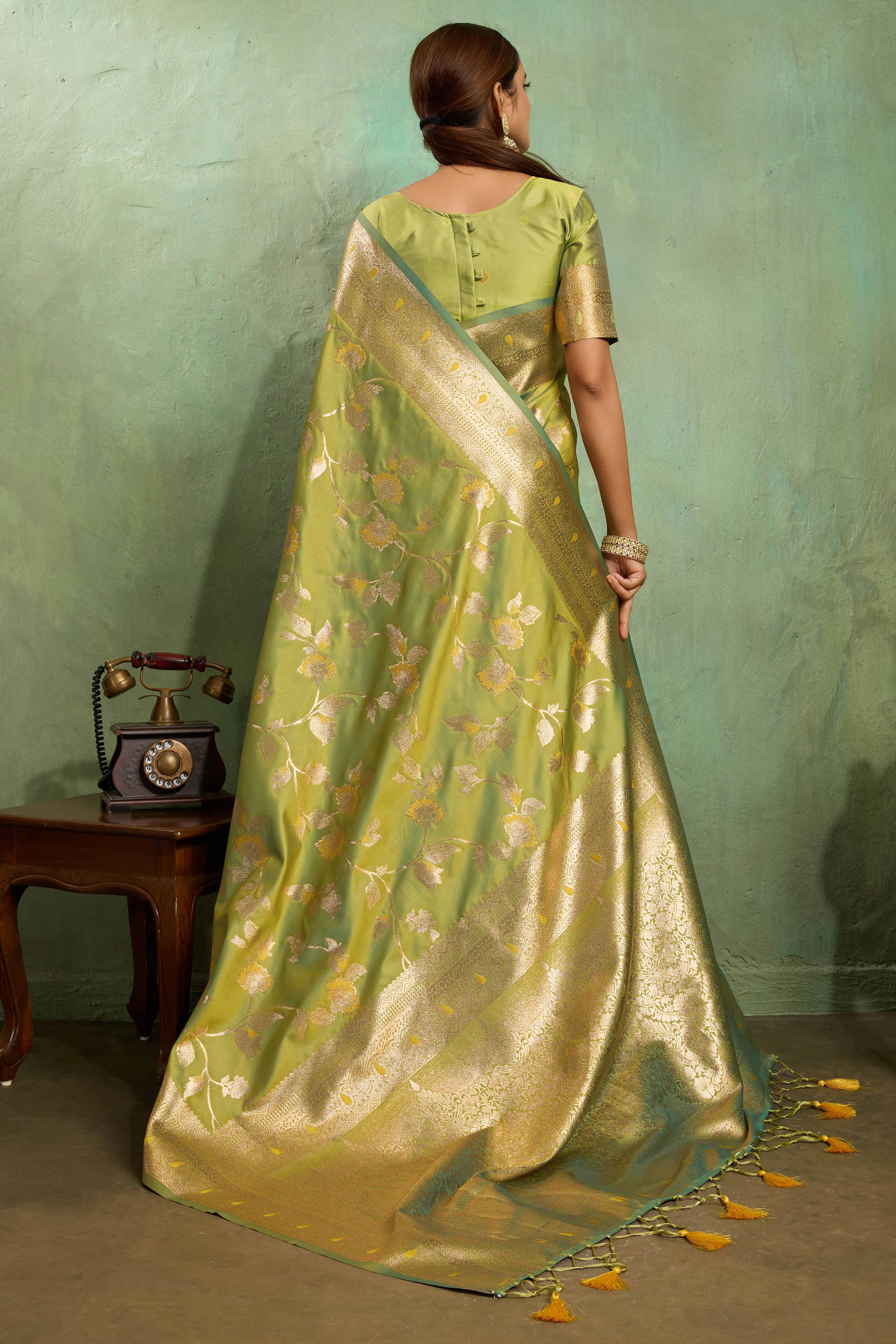 Green Dual Tone Banarasi Silk Saree Accented with Meenakari Weaves