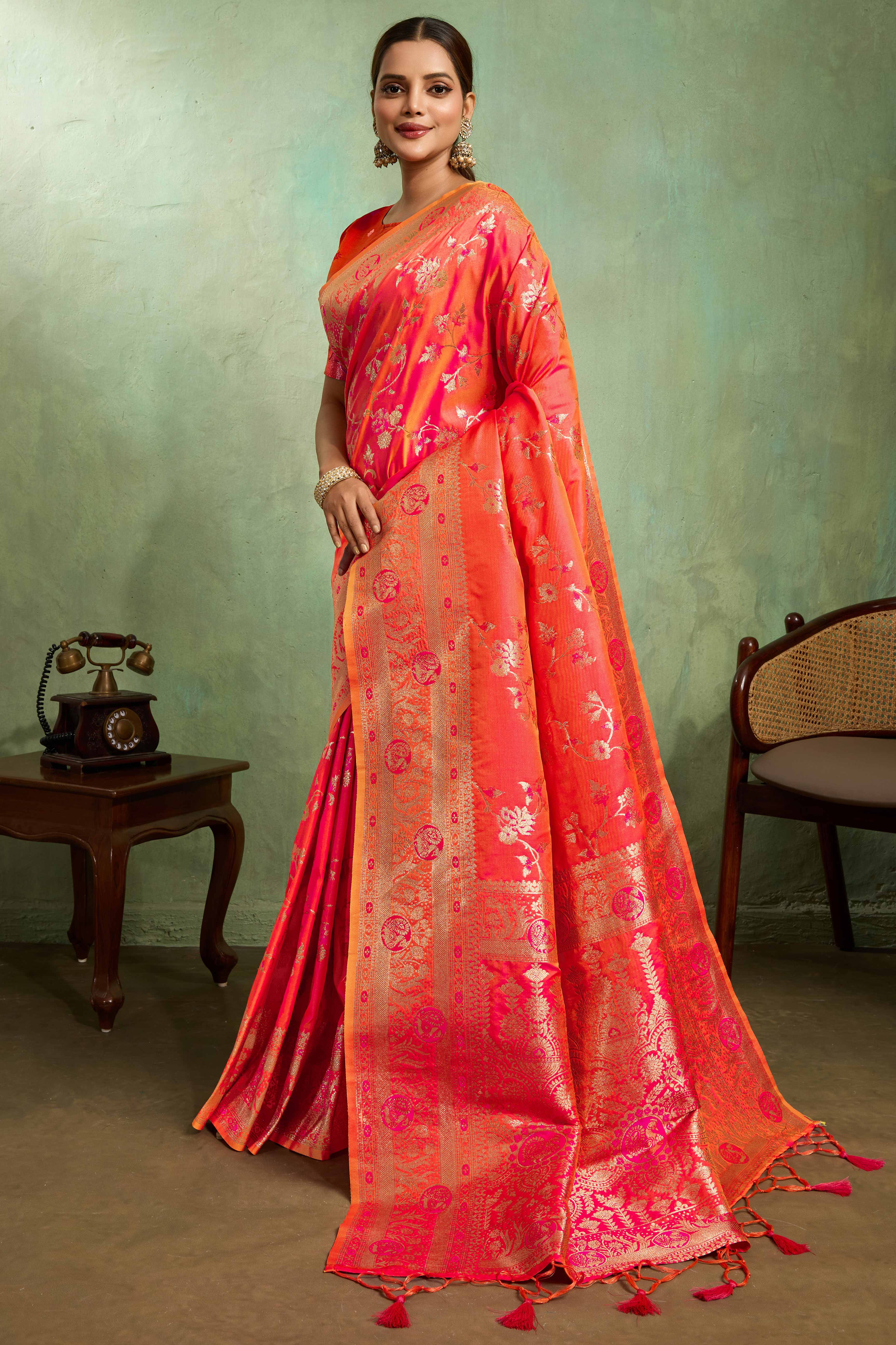 Coral Red Dual Tone Banarasi Silk Saree Accented with Meenakari Weaves