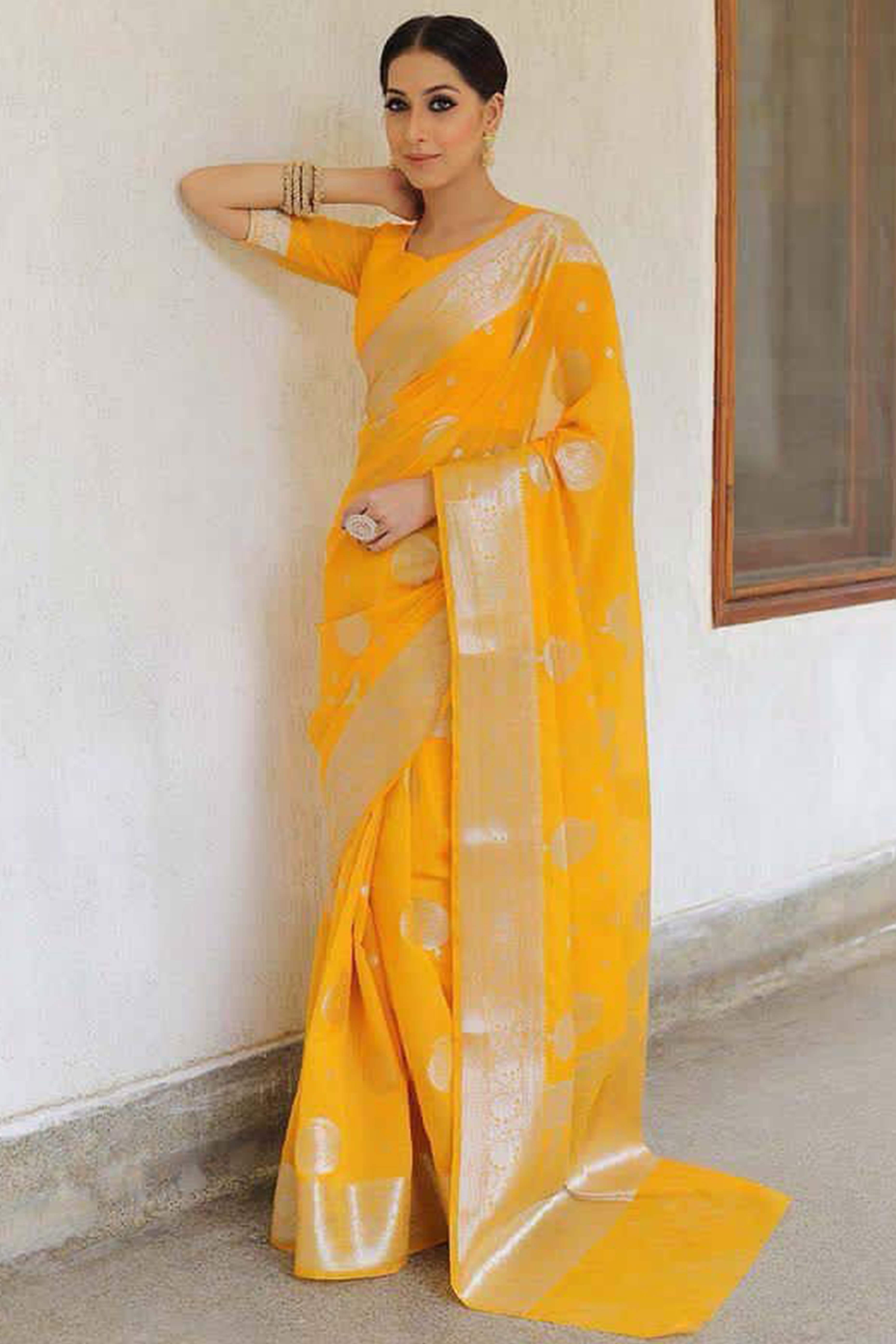 Vibrant Yellow Floral Zari Woven Lichi Banarasi Silk Saree With Rich Detailing