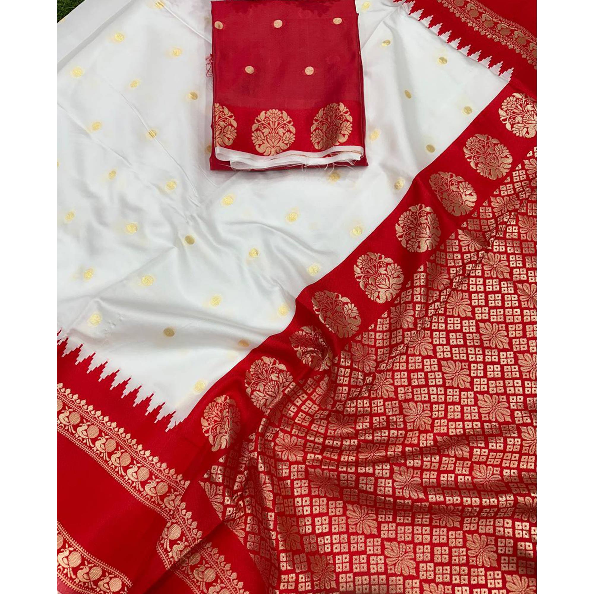 Graceful White & Red Zari Woven Lichi Banarasi Silk Saree With Tassel Accents