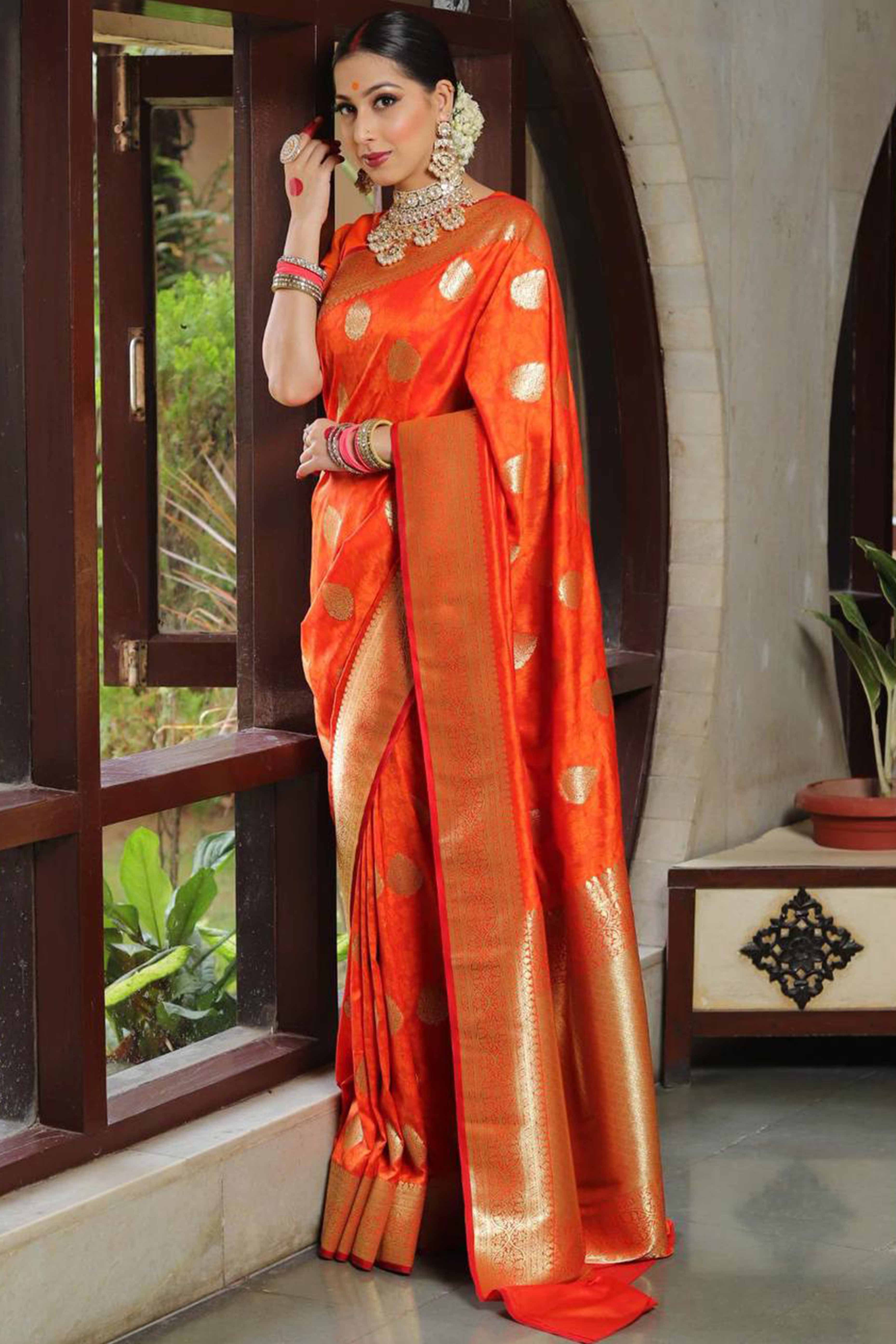 Orange Floral Woven Lichi Banarasi Silk Saree