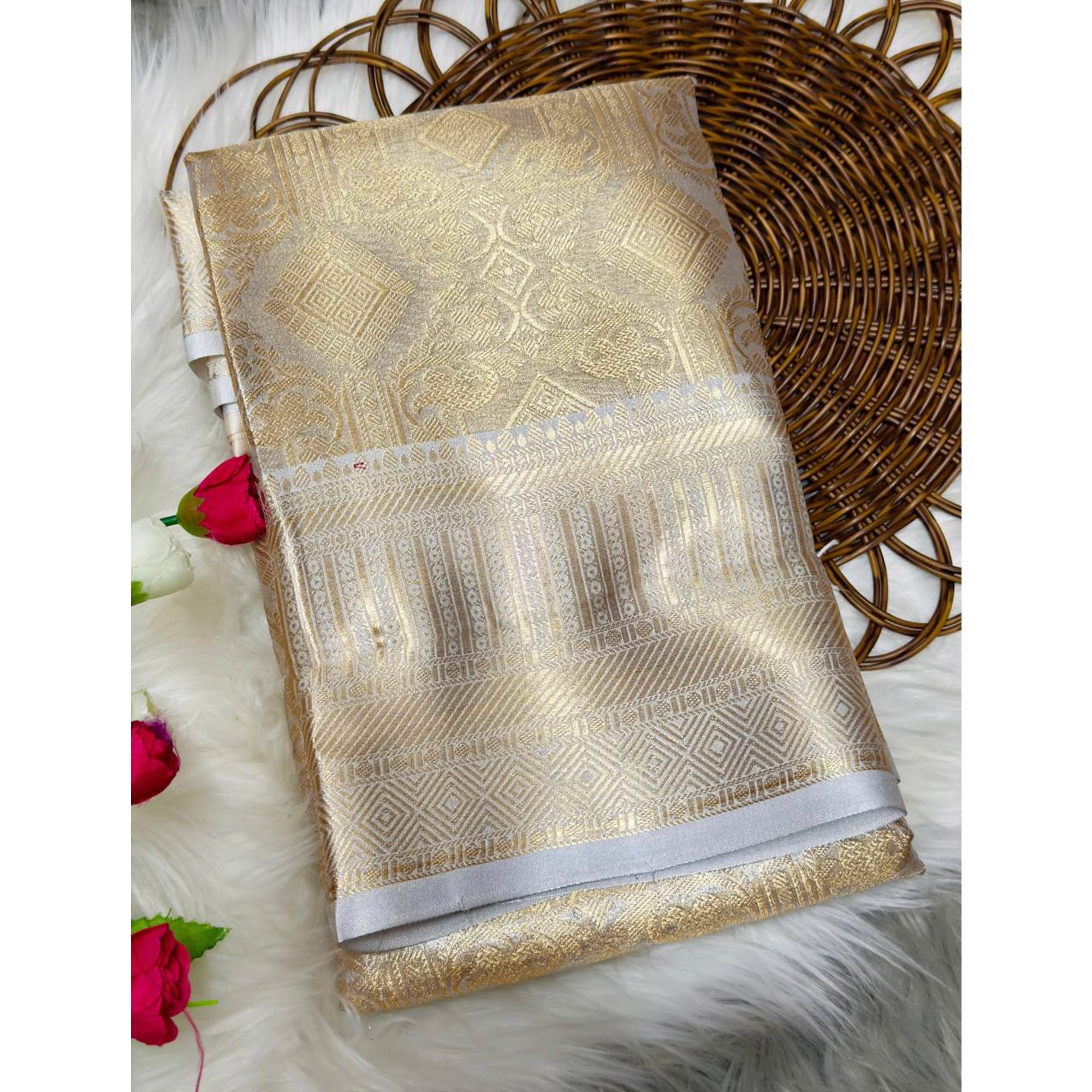 Handloom Banarasi Golden Tissue Silk Saree Adorned with Intricate Traditional Patterns
