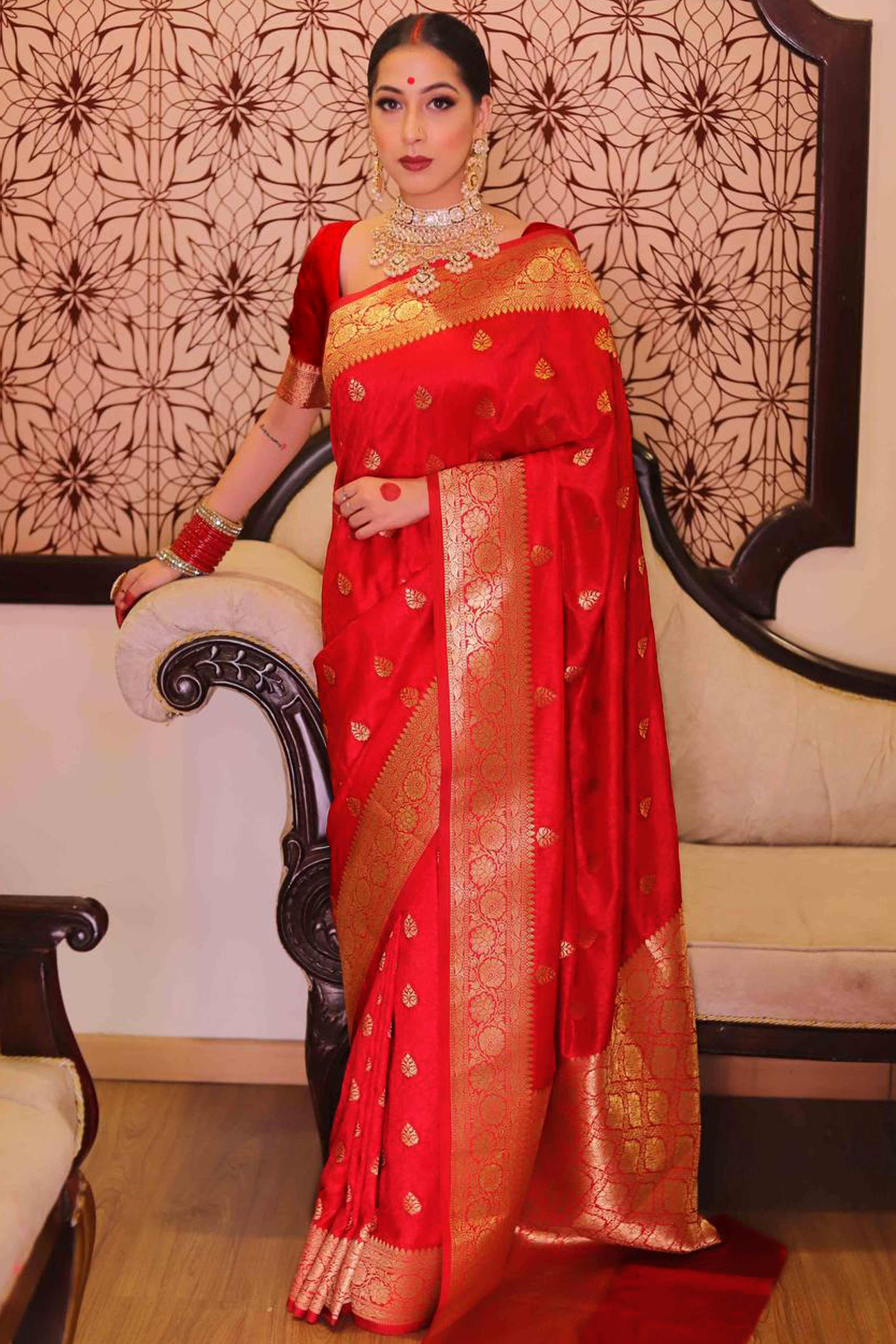 Red Zari Butti Embellished Banarasi Silk Saree Offering Timeless Grace and Festive Charm