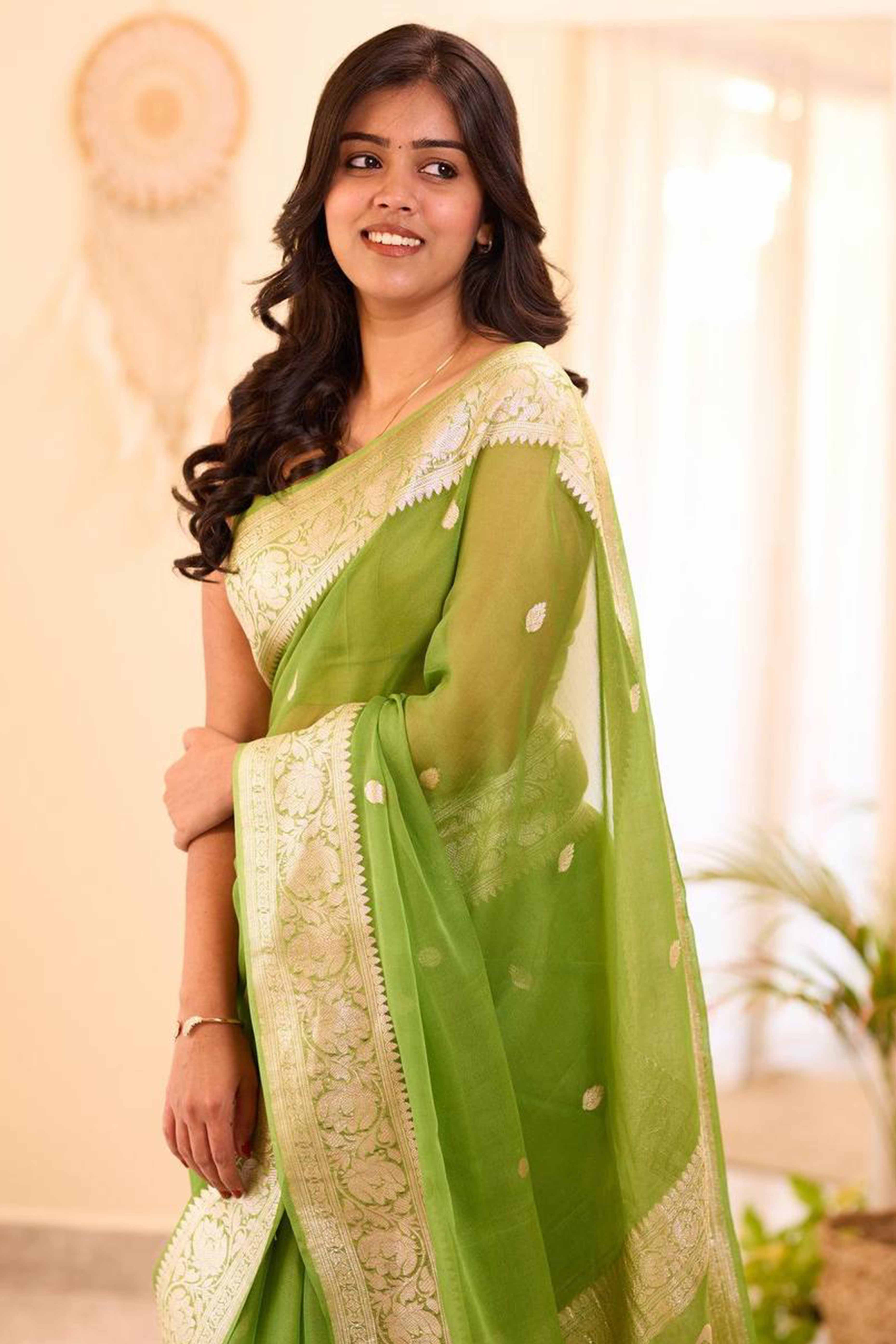 Sophisticated Light Green Linen Saree with Traditional Butti Zari Weaving