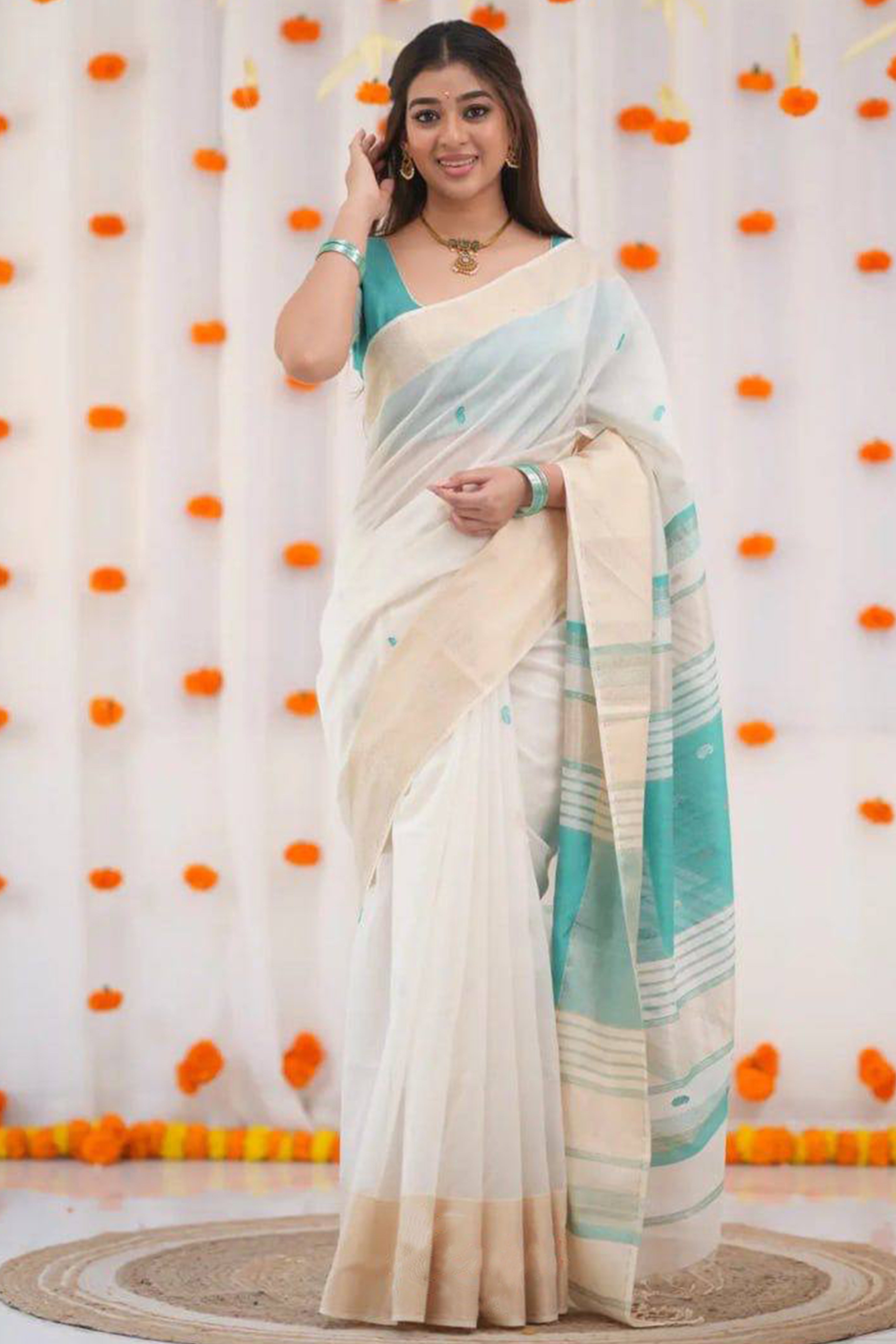 White and Turquoise Zari-Woven Linen Cotton Saree Offering a Refined Festive Look