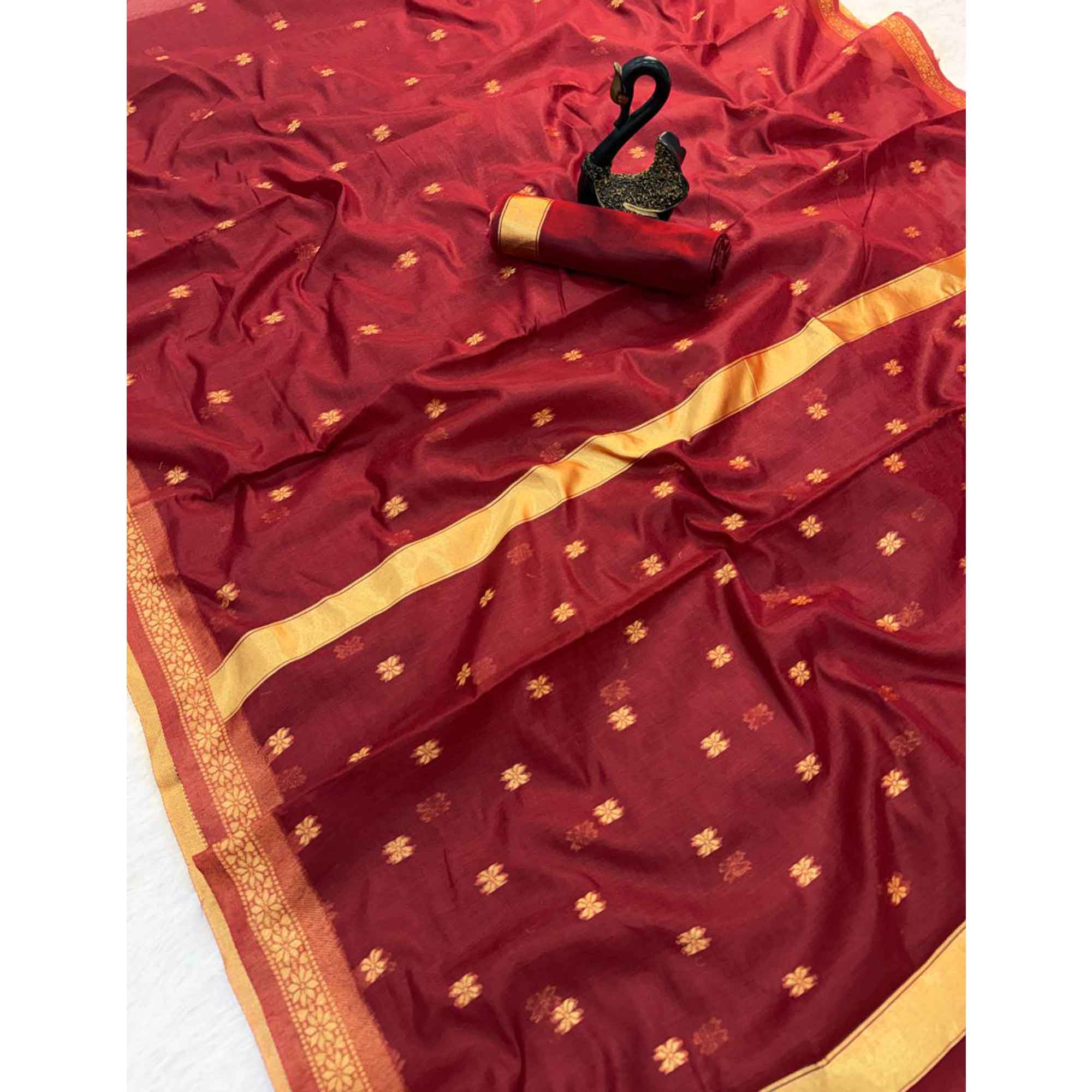 Maroon Classic Linen Cotton Saree Enhanced with Fine Zari Butti Weaving Detailing