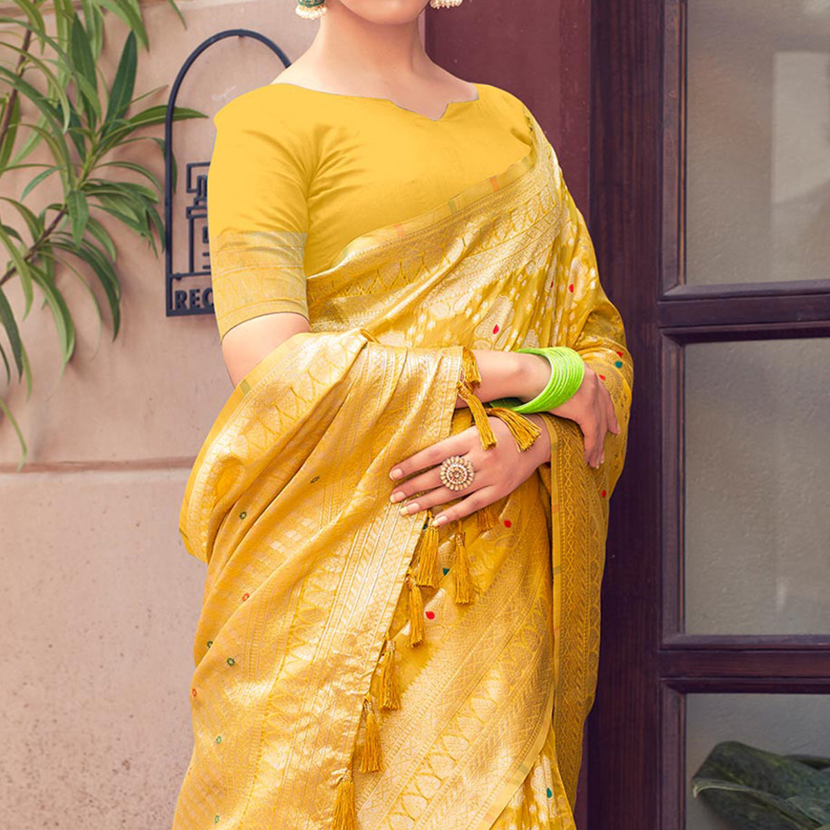 Yellow Woven Cotton Silk Saree With Tassels