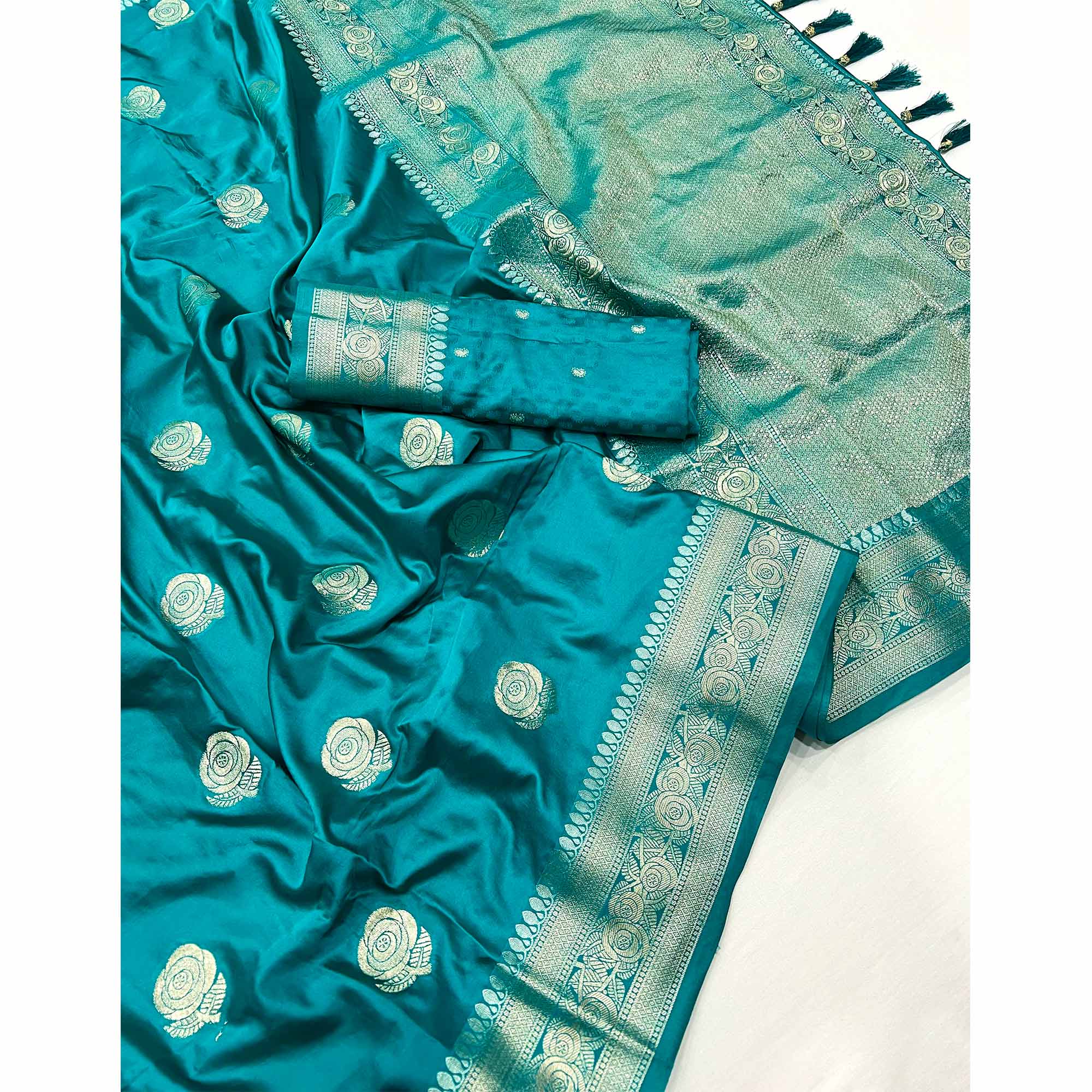 Rama Green Floral Woven Satin Silk Saree With Tassels