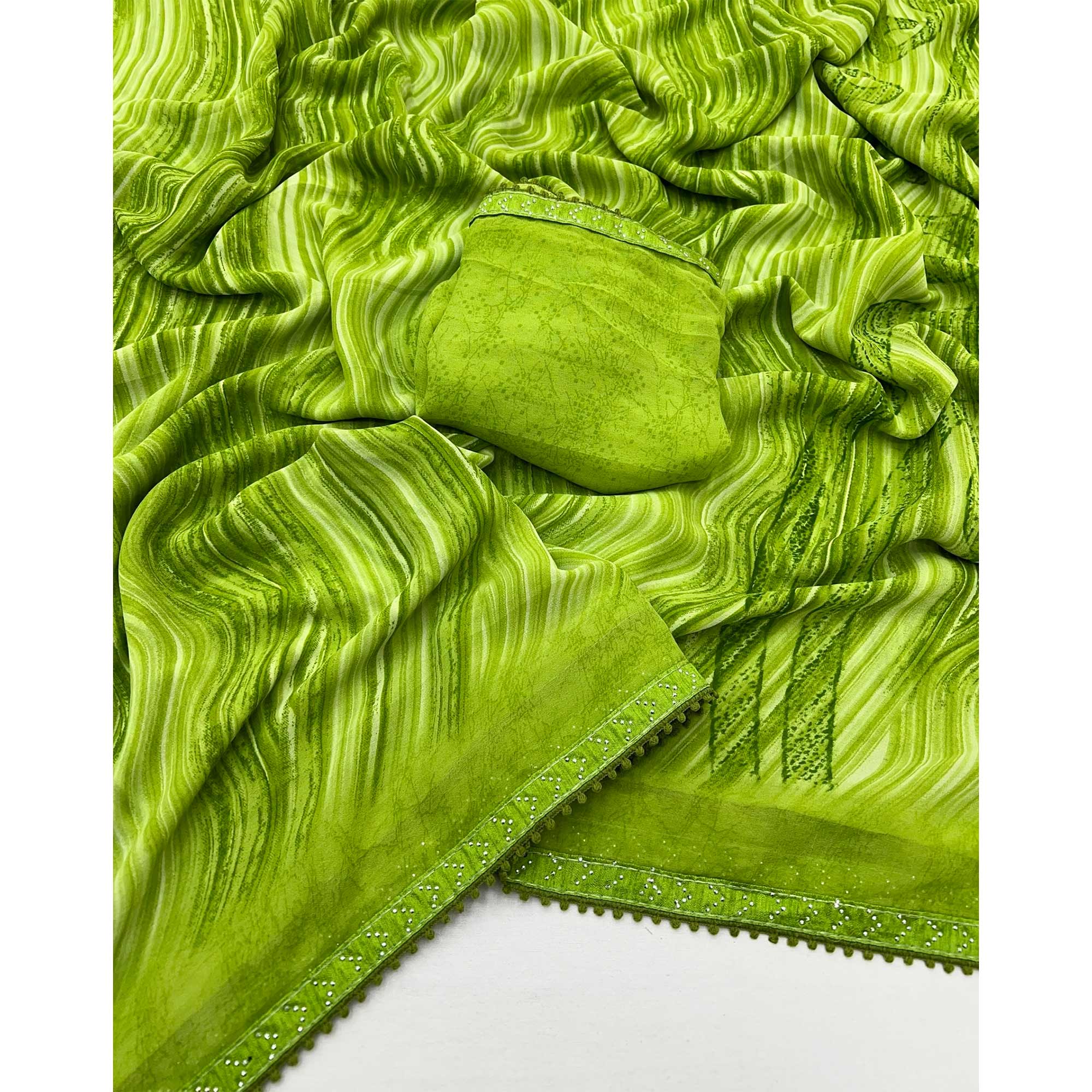 Green Printed Georgette Saree With Fancy Lace Border