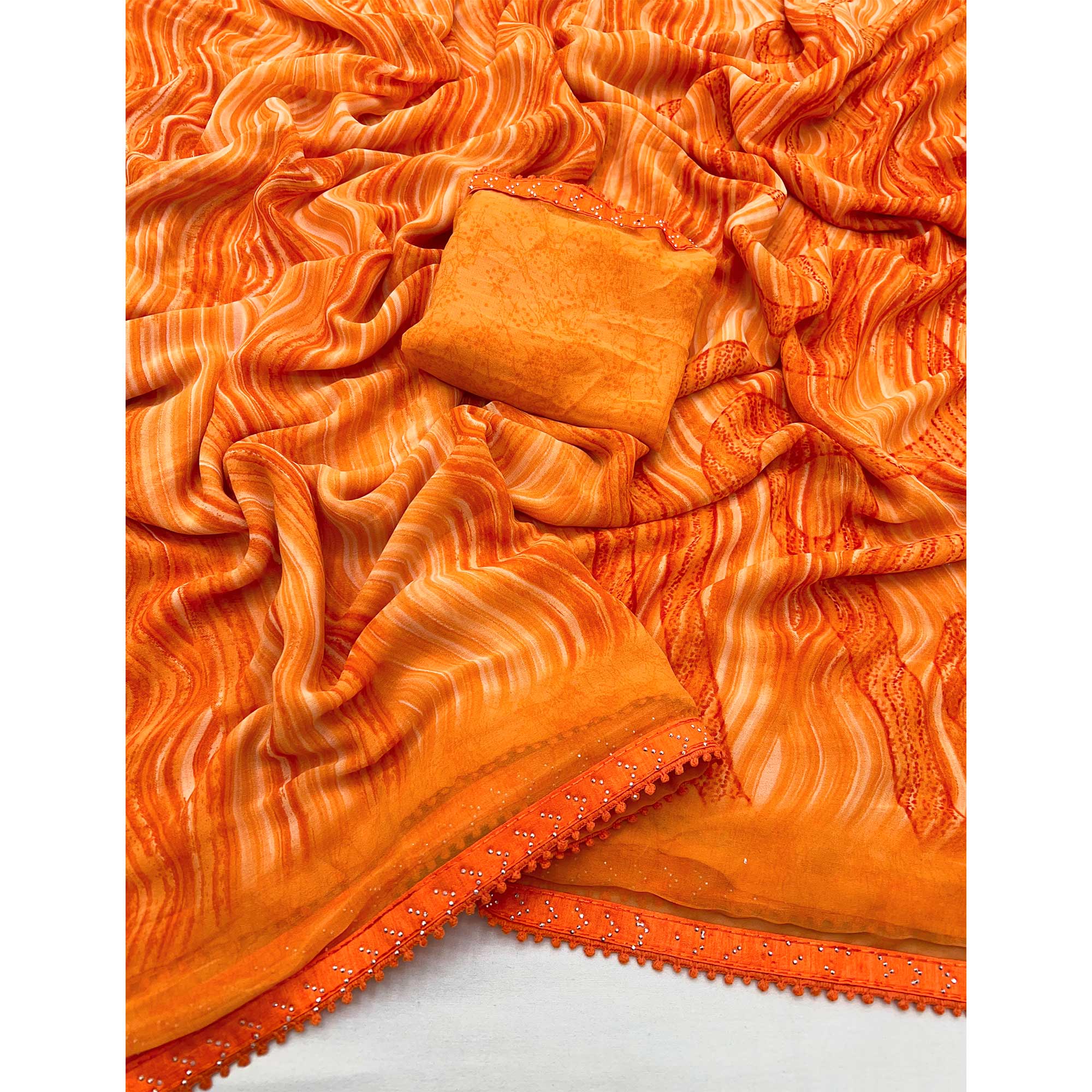 Orange Printed Georgette Saree With Fancy Lace Border