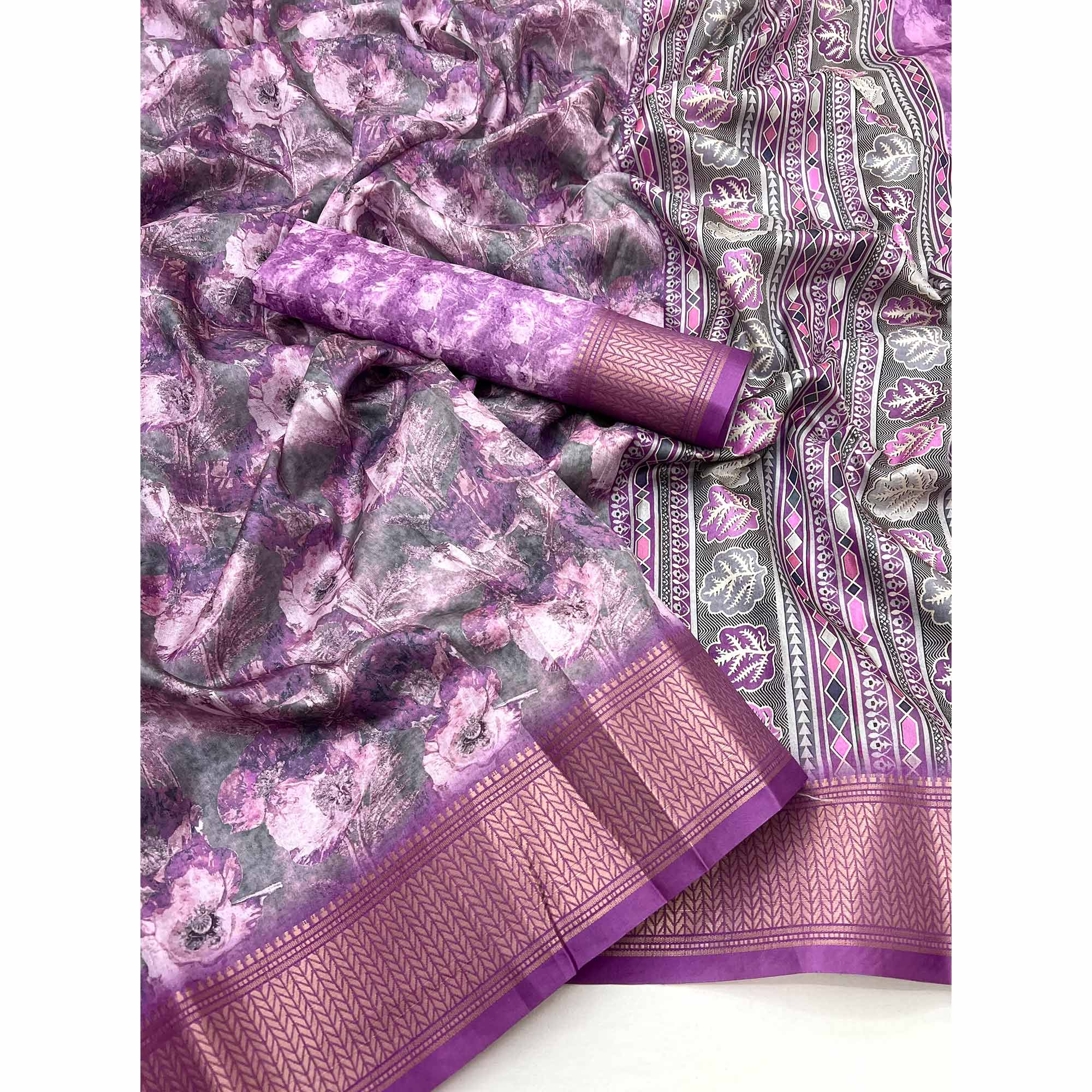 Purple Elegance In Dola Saree Featuring Blooming Digital Prints & Zari Border & Tassel Pallu