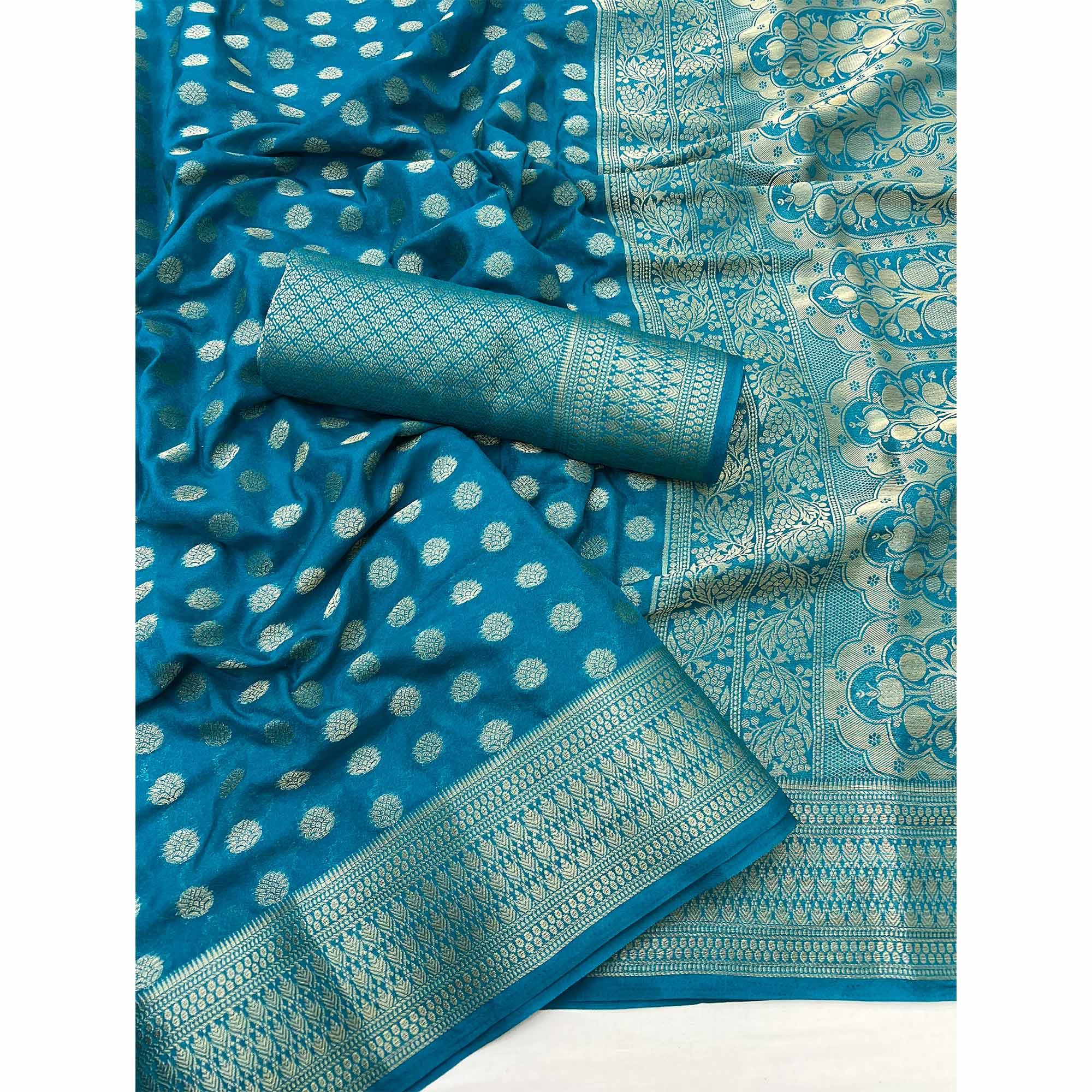 Teal Blue Floral Zari Woven Crepe Silk Saree Accented With Tassel Pallu