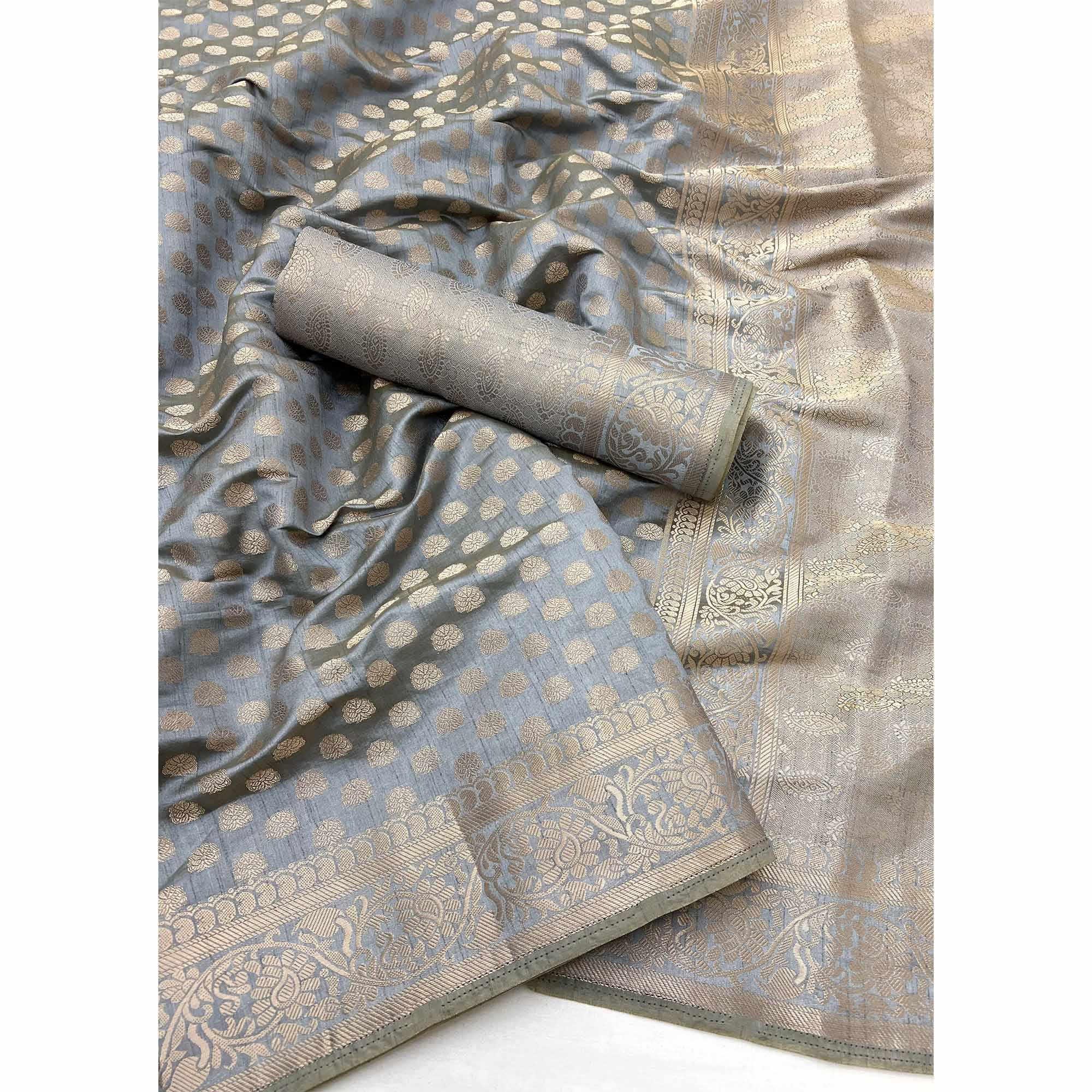 Grey Tusser Cotton Silk Saree Featuring Intricate Floral Zari Weave & Tassel Pallu