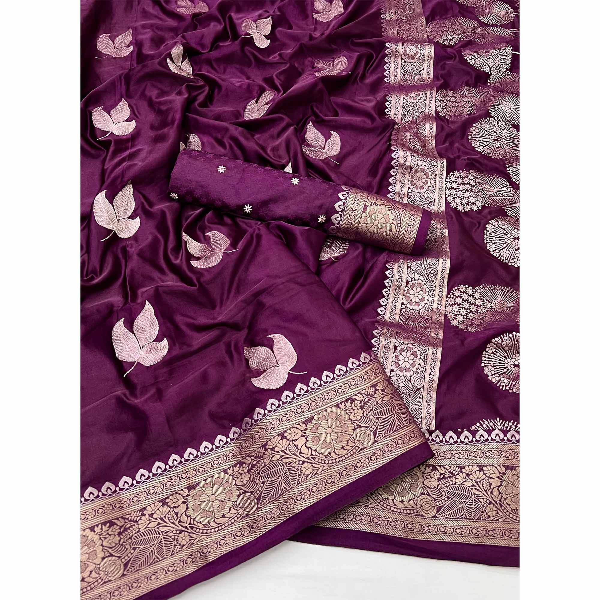 Wine Floral Zari Woven Satin Silk Saree With Graceful Tassel Pallu