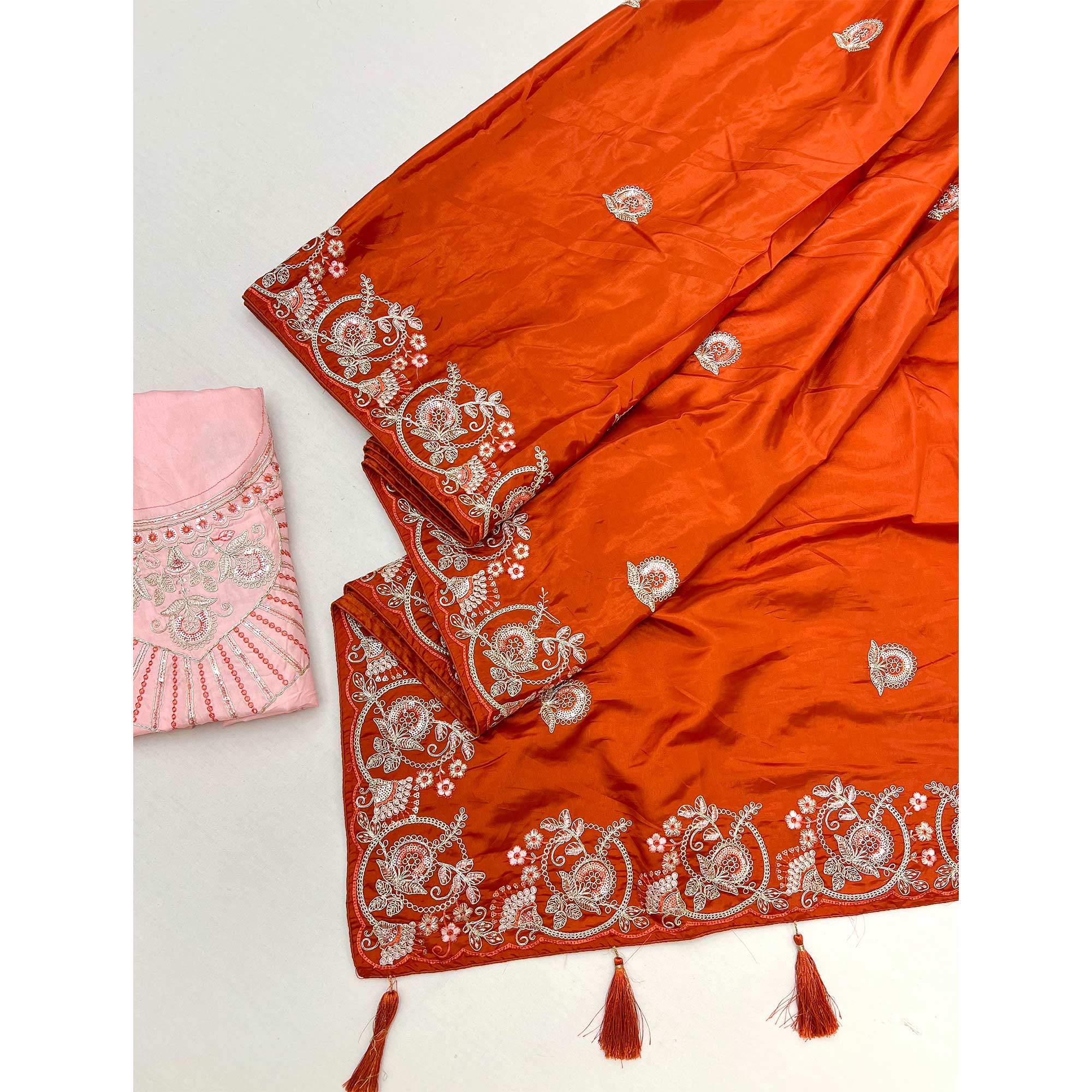 Orange Embroidered Satin Saree with Smooth Texture and Graceful Festive Appeal