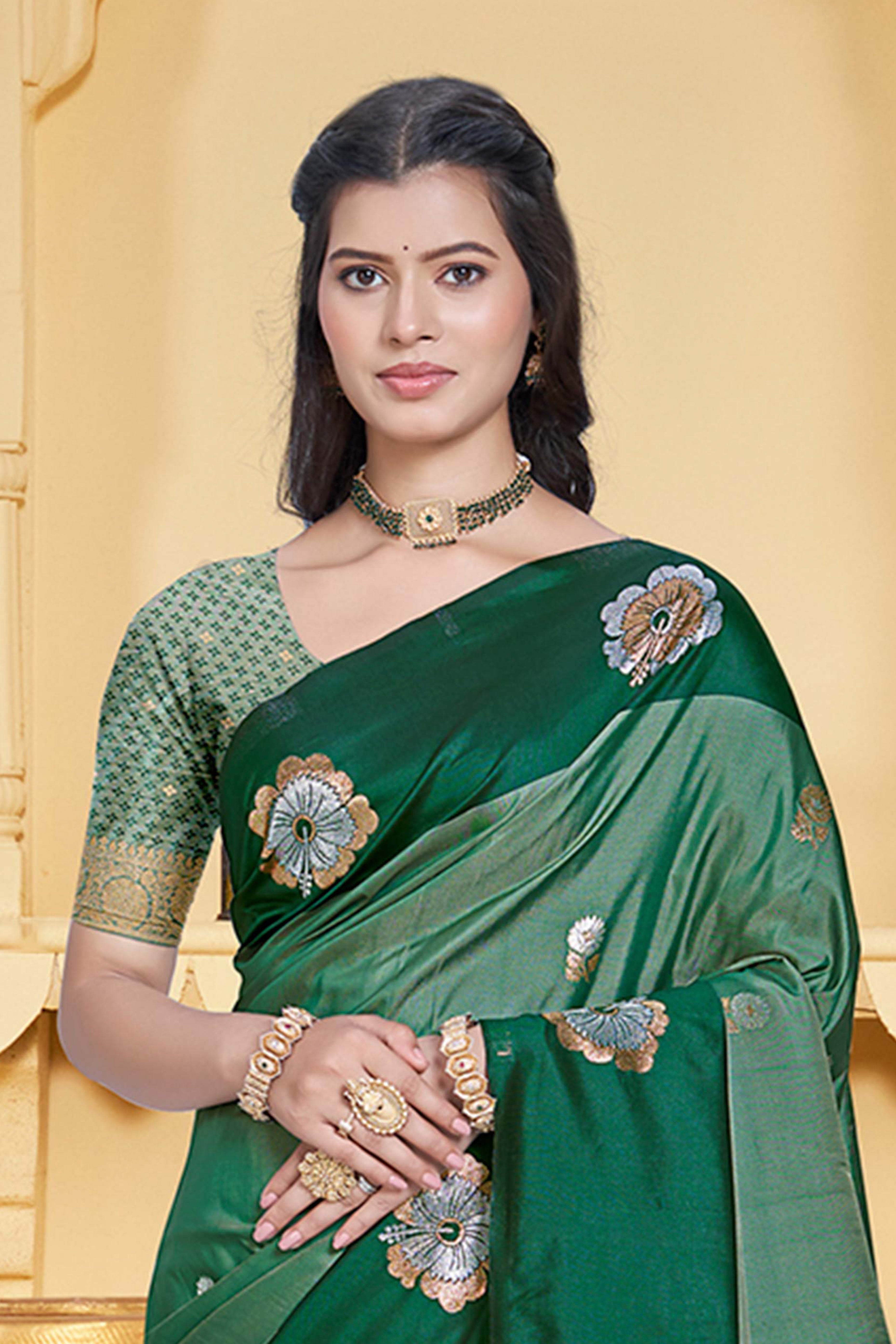 Charming Green Floral Zari Weaving Silk Blend Saree Enhanced With Stylish Tassel Pallu