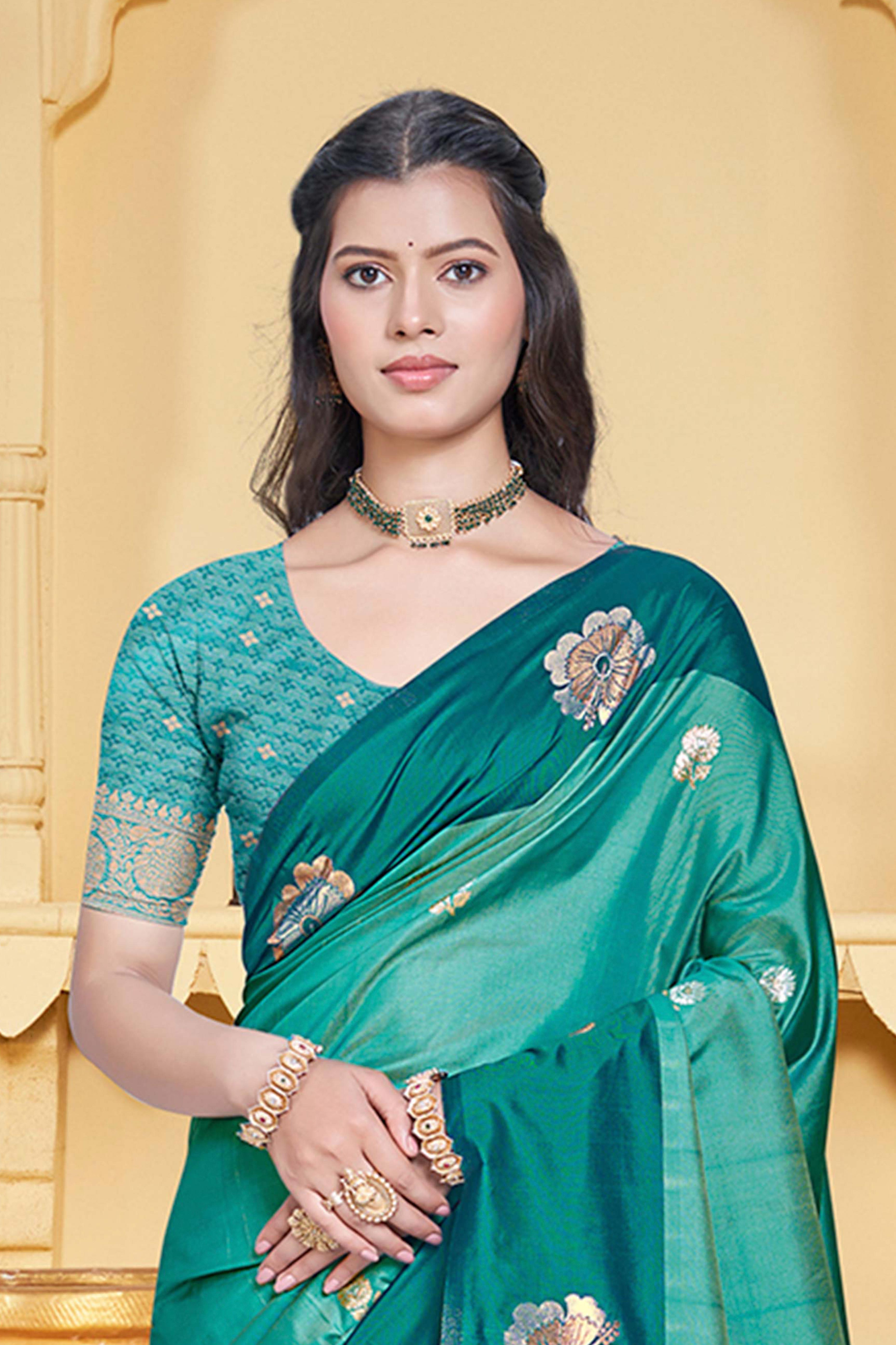Charming Rama Green Floral Zari Weaving Silk Blend Saree Enhanced With Stylish Tassel Pallu