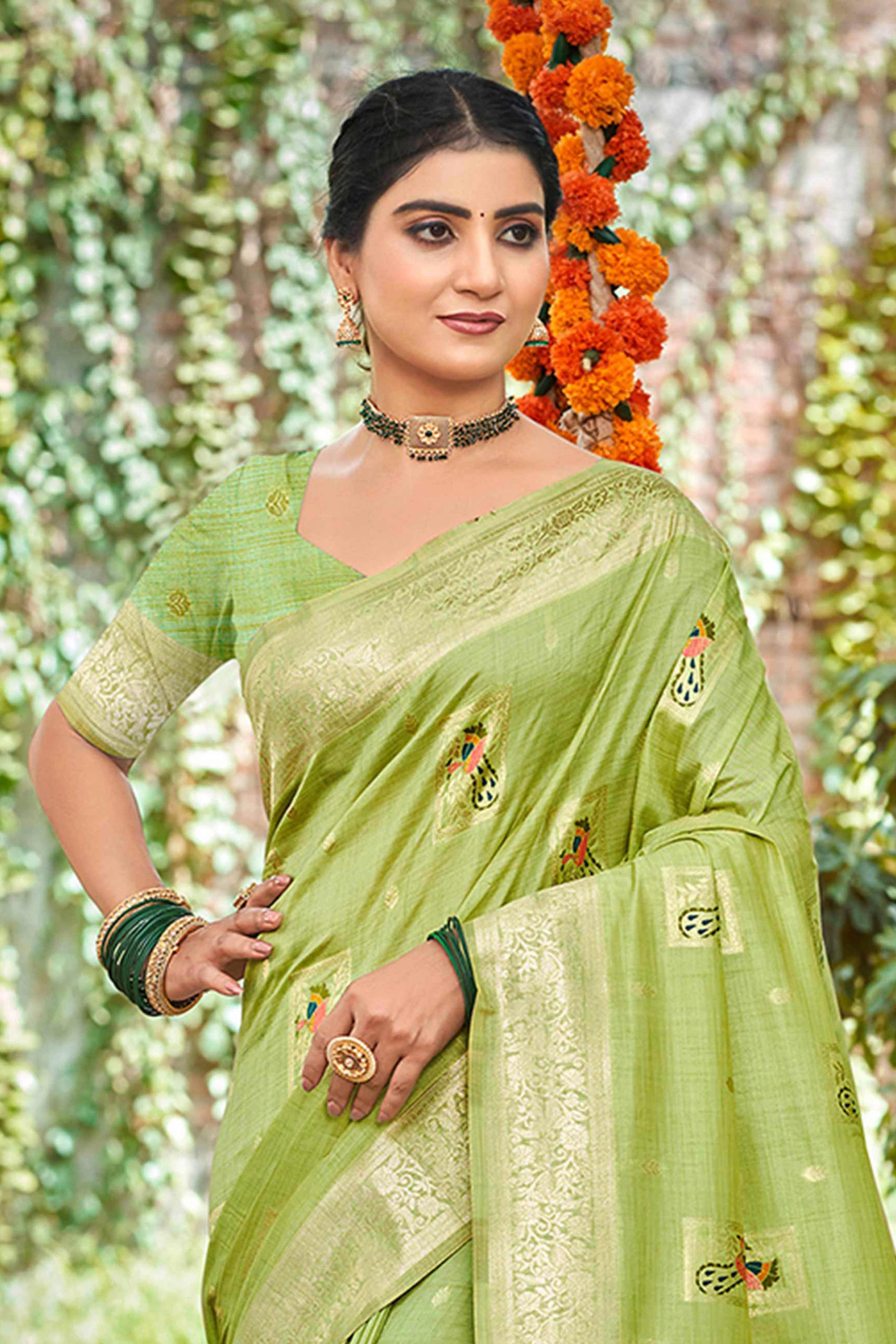 Green Floral & Peacock Motif Zari Woven Assam Silk Blend Saree With Graceful Tassel Pallu