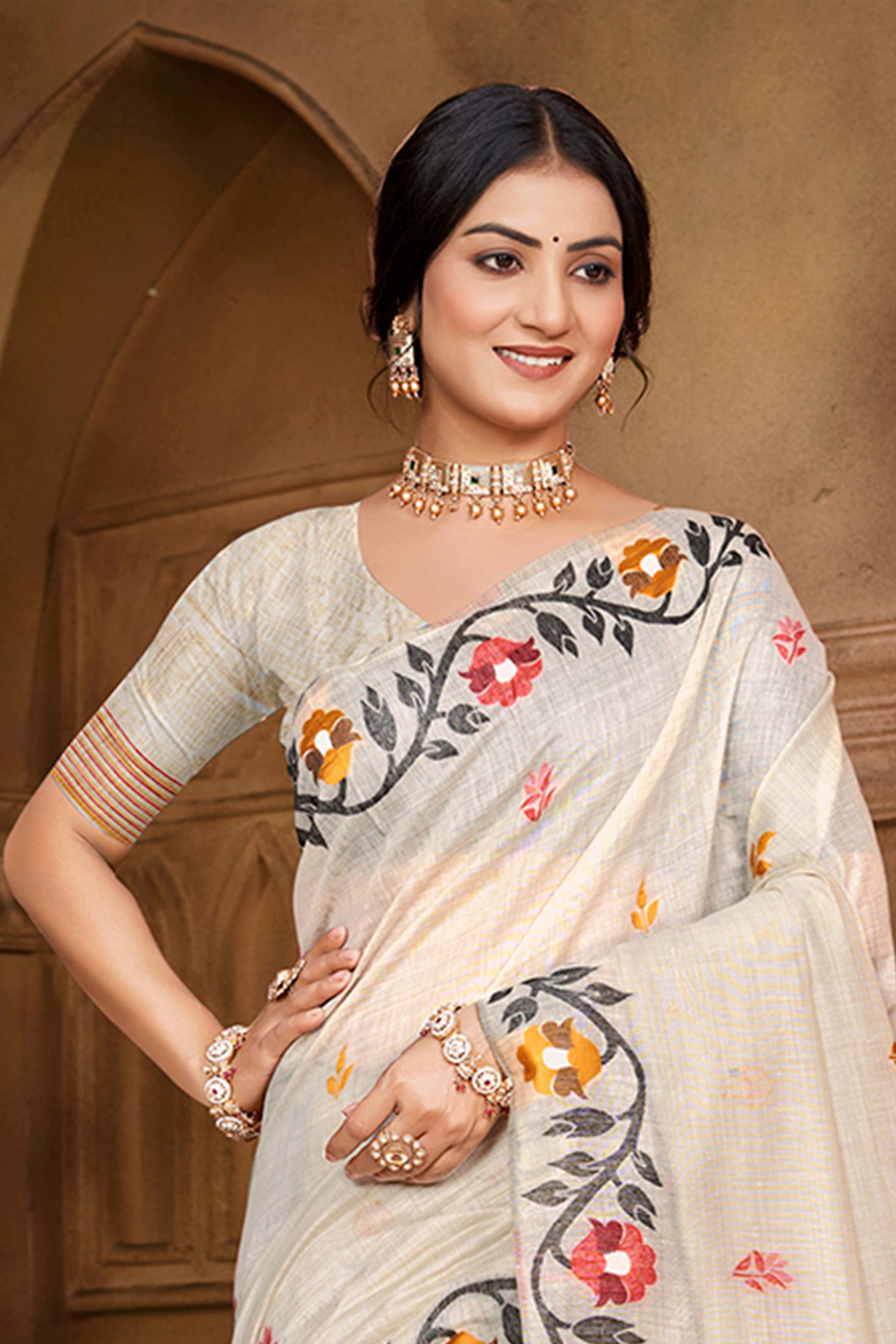 Charming Beige Floral Weaving Cotton Silk Saree Enhanced With Tree Motif Pallu With Tassel