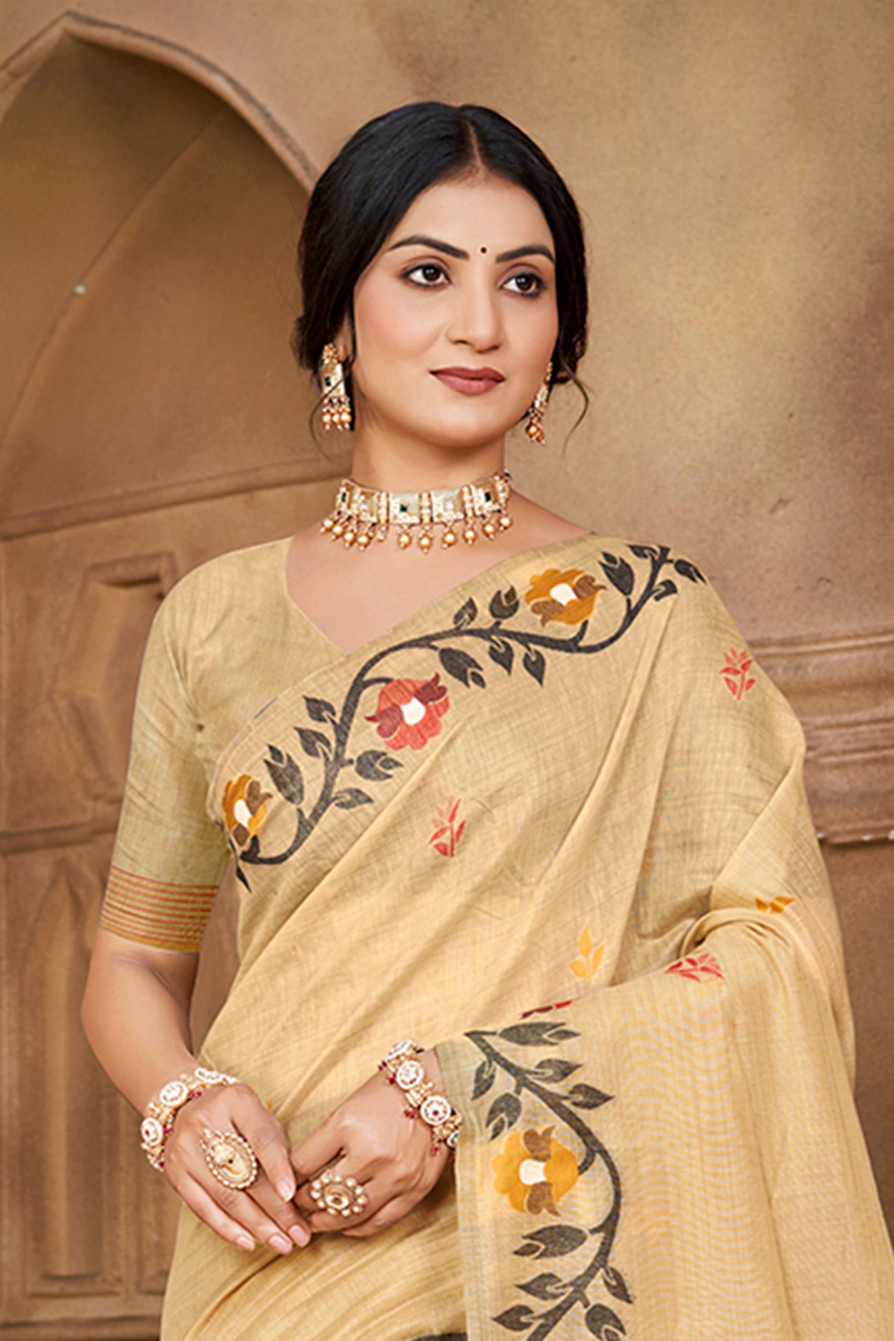 Charming Chikoo Floral Weaving Cotton Silk Saree Enhanced With Tree Motif Pallu With Tassel