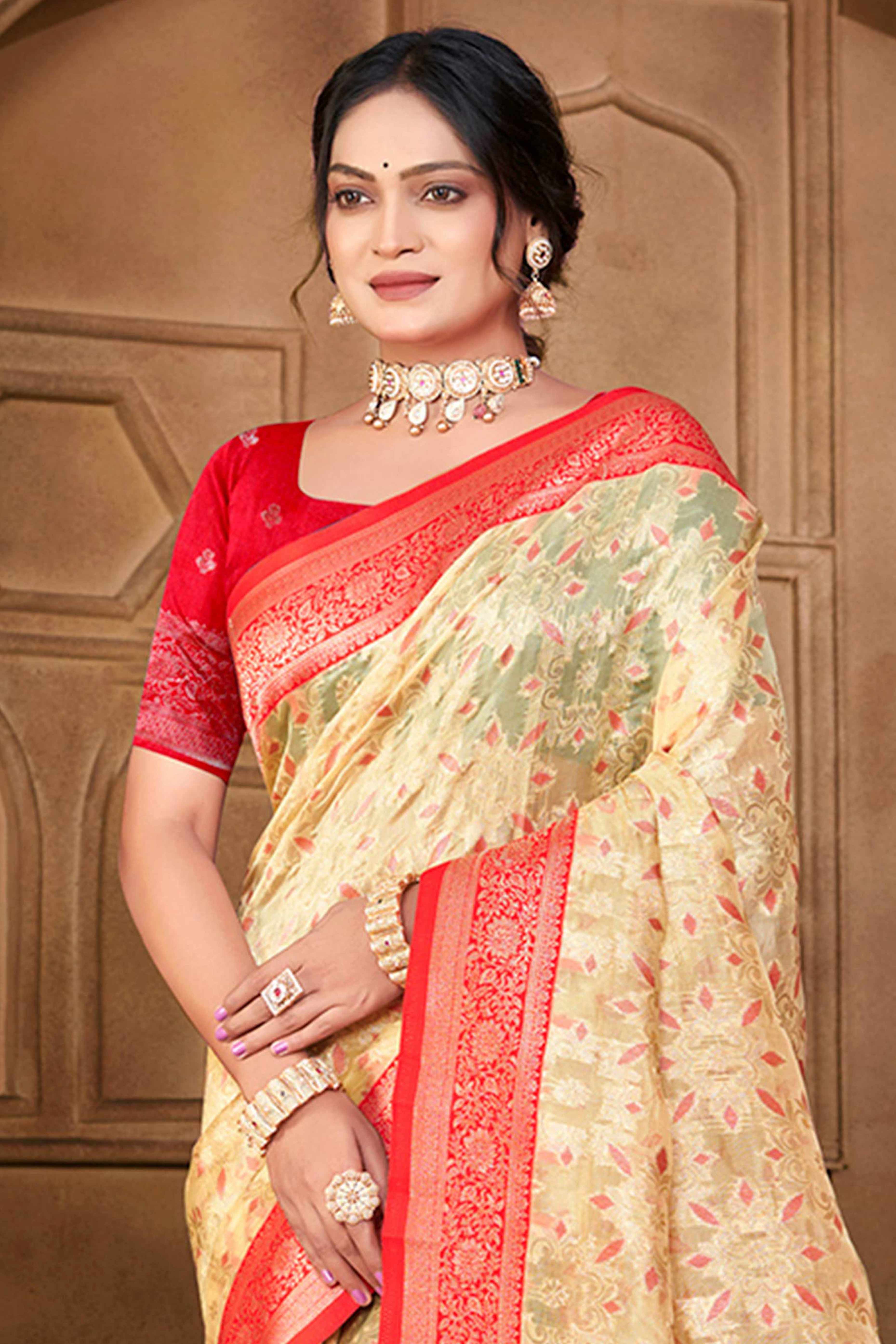 Stunning Cream & Pink Floral Weaving Silk Blend Saree Enhanced With A Stylish Tassel Pallu